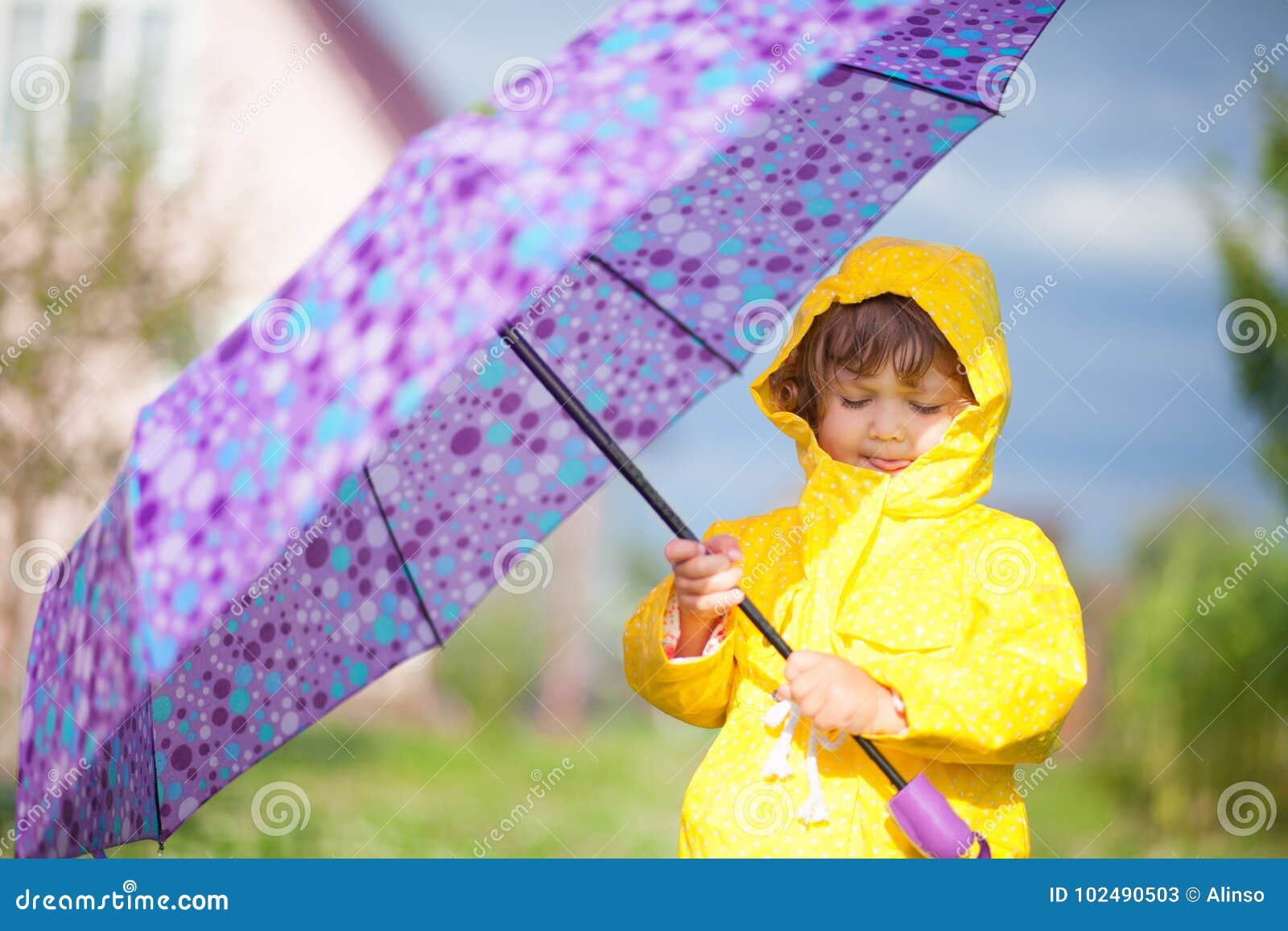 Rainy Day. Happy Toddler Girl Wearing Waterproof Coat with Umbrella ...