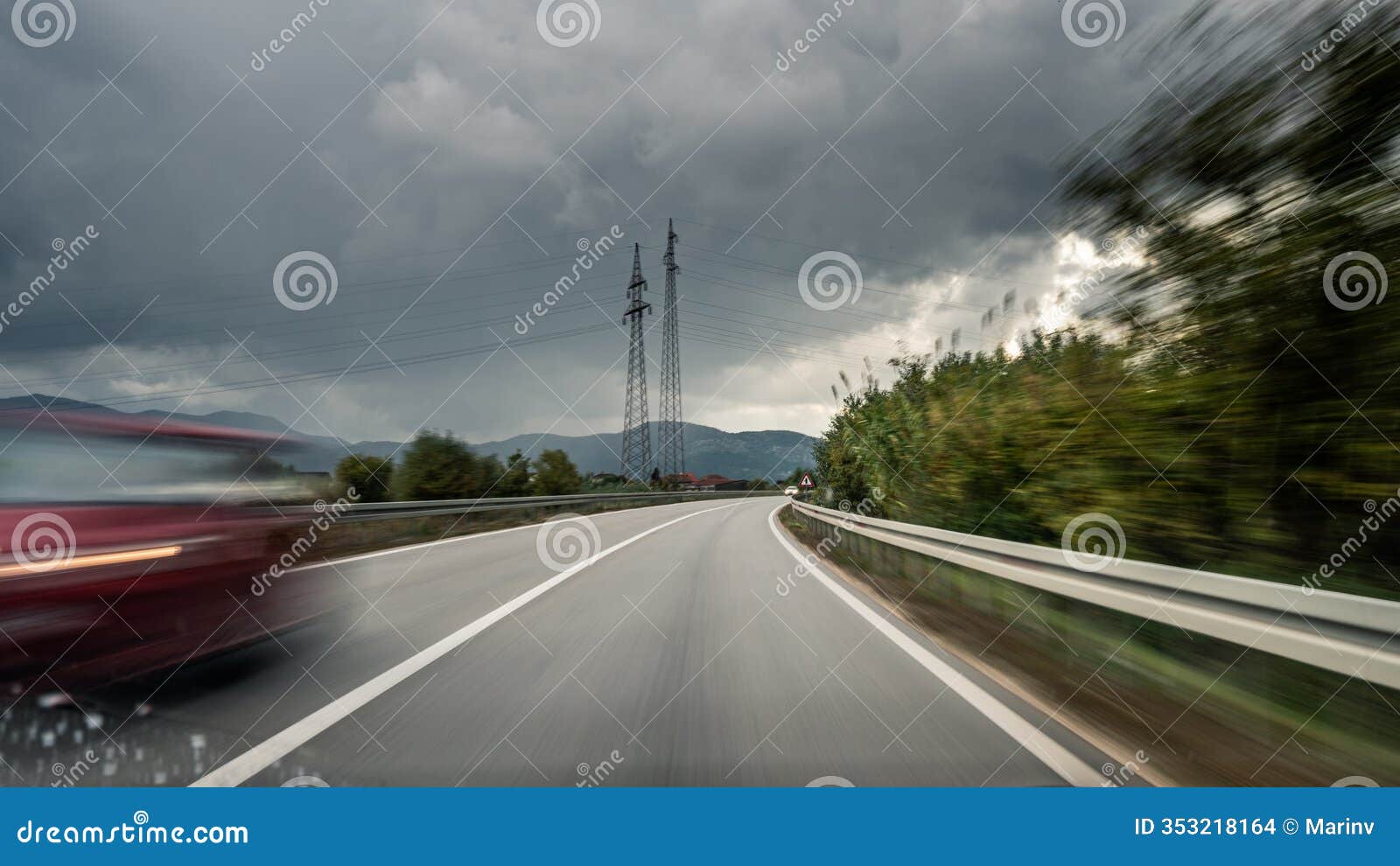 rainy highway view capturing speed and reckless driving on a stormy day