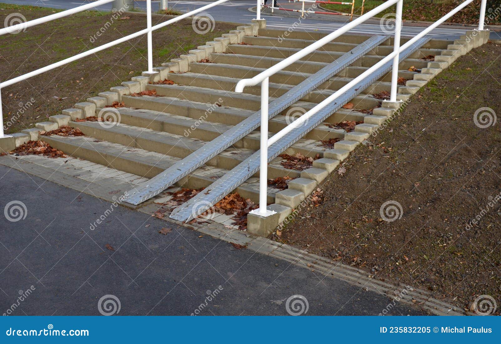 Ramp Combined with a Gray Concrete Staircase and a Handrail Specially ...