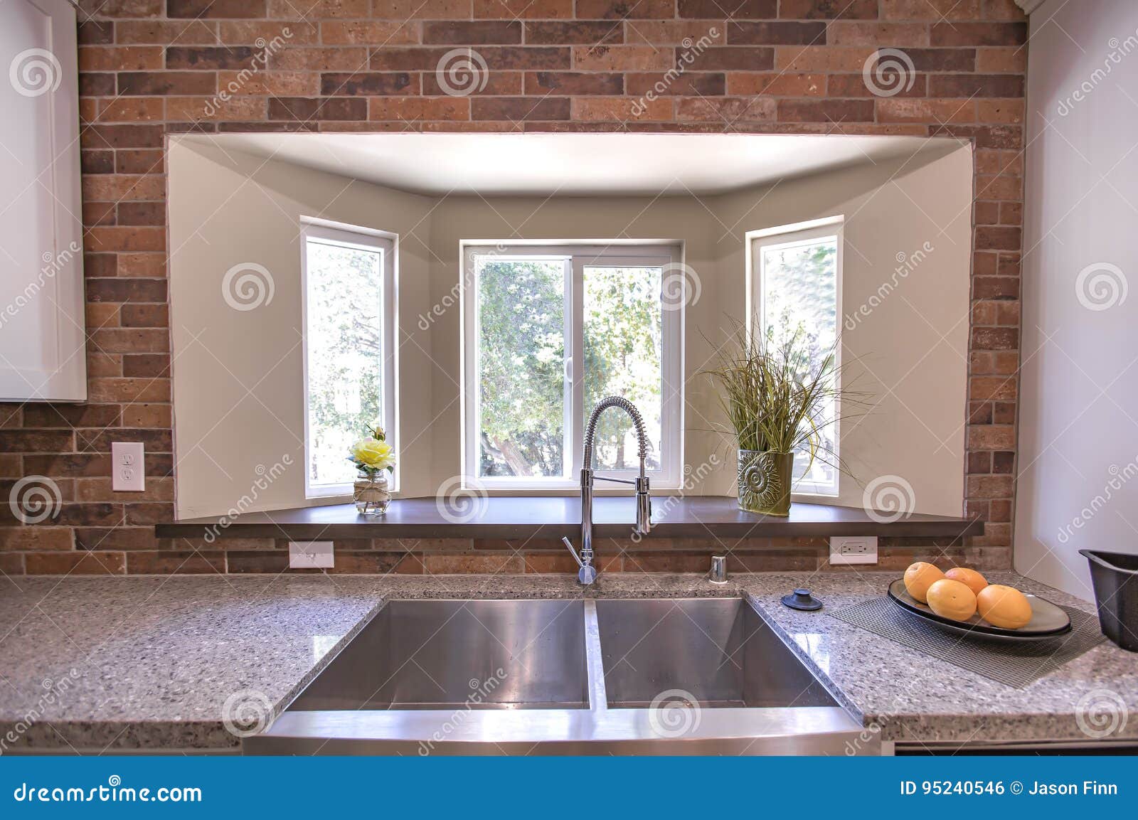 Ranch Style Kitchen Sink With Brick In California Model Home