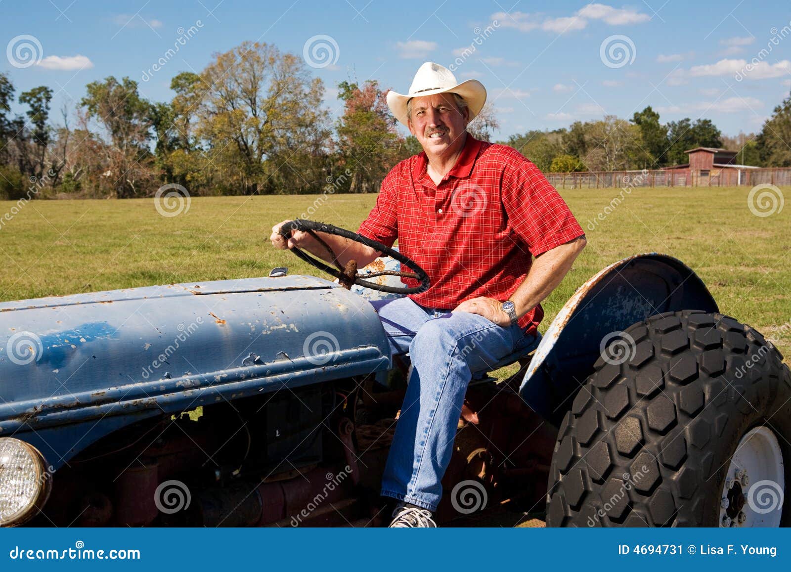 rancher on tractor