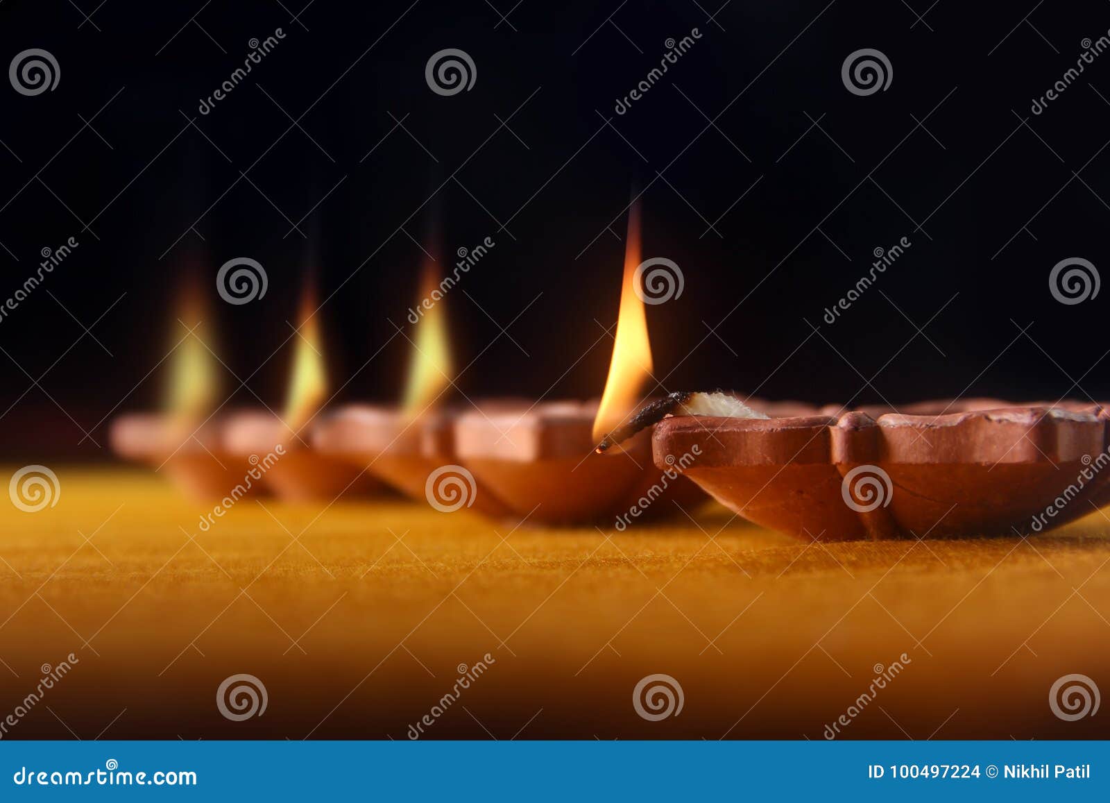 Rangoli Design Around Diwali Lamp Stock Photo - Image of flame ...