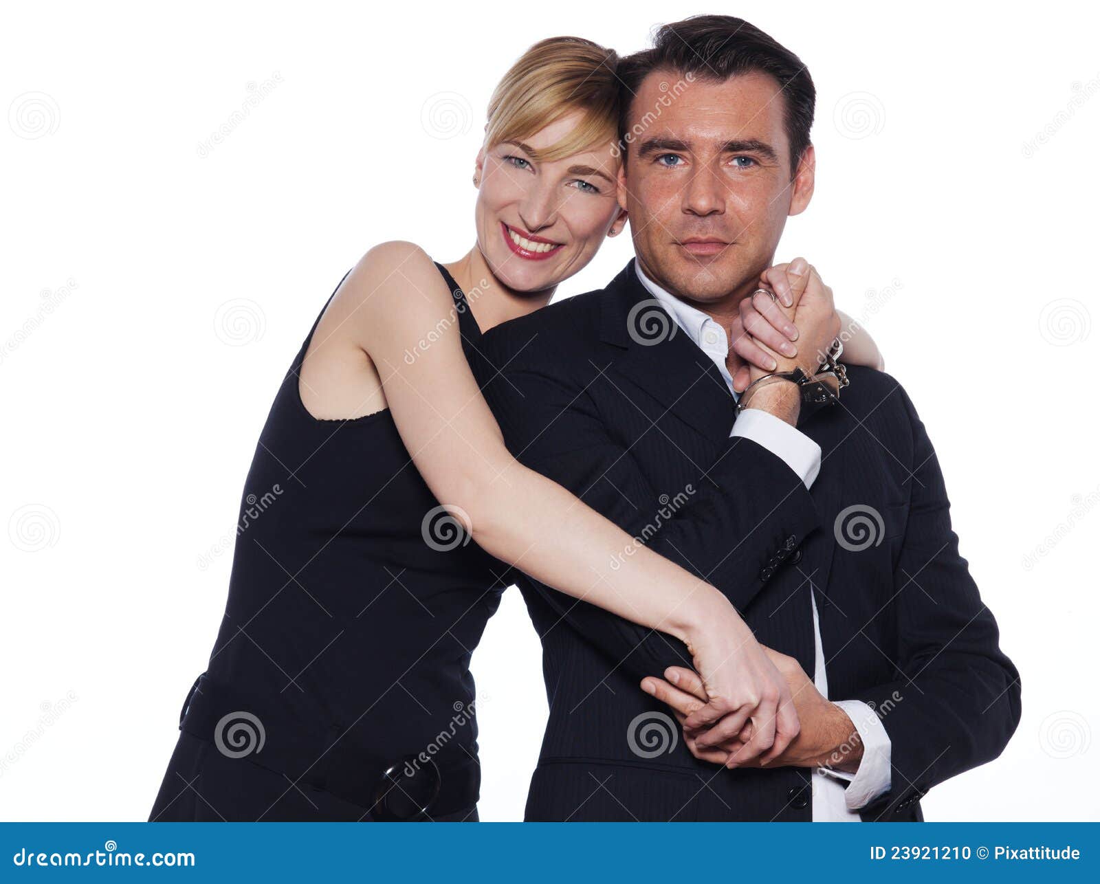 Couple Jeunes Adultes Tenant Les Menottes Regardant Isolés Sur Blanc image  libre de droit par IgorVetushko © #224595788