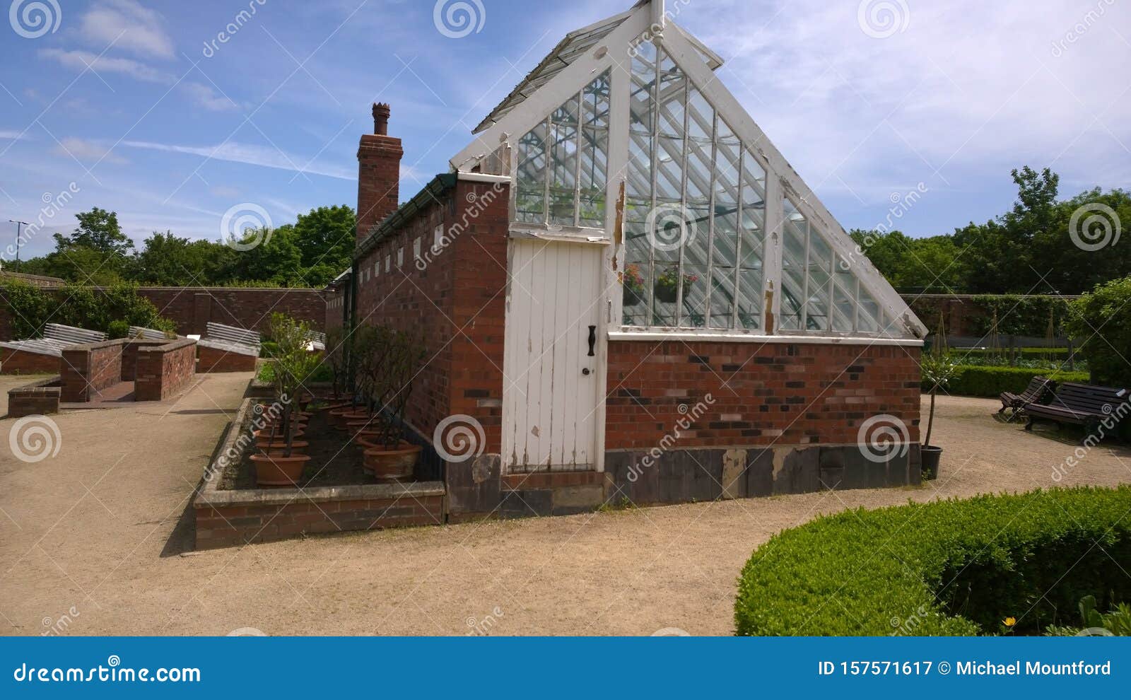 Victorian Greenhouse Set In Walled Garden West Bromwich Uk Stock