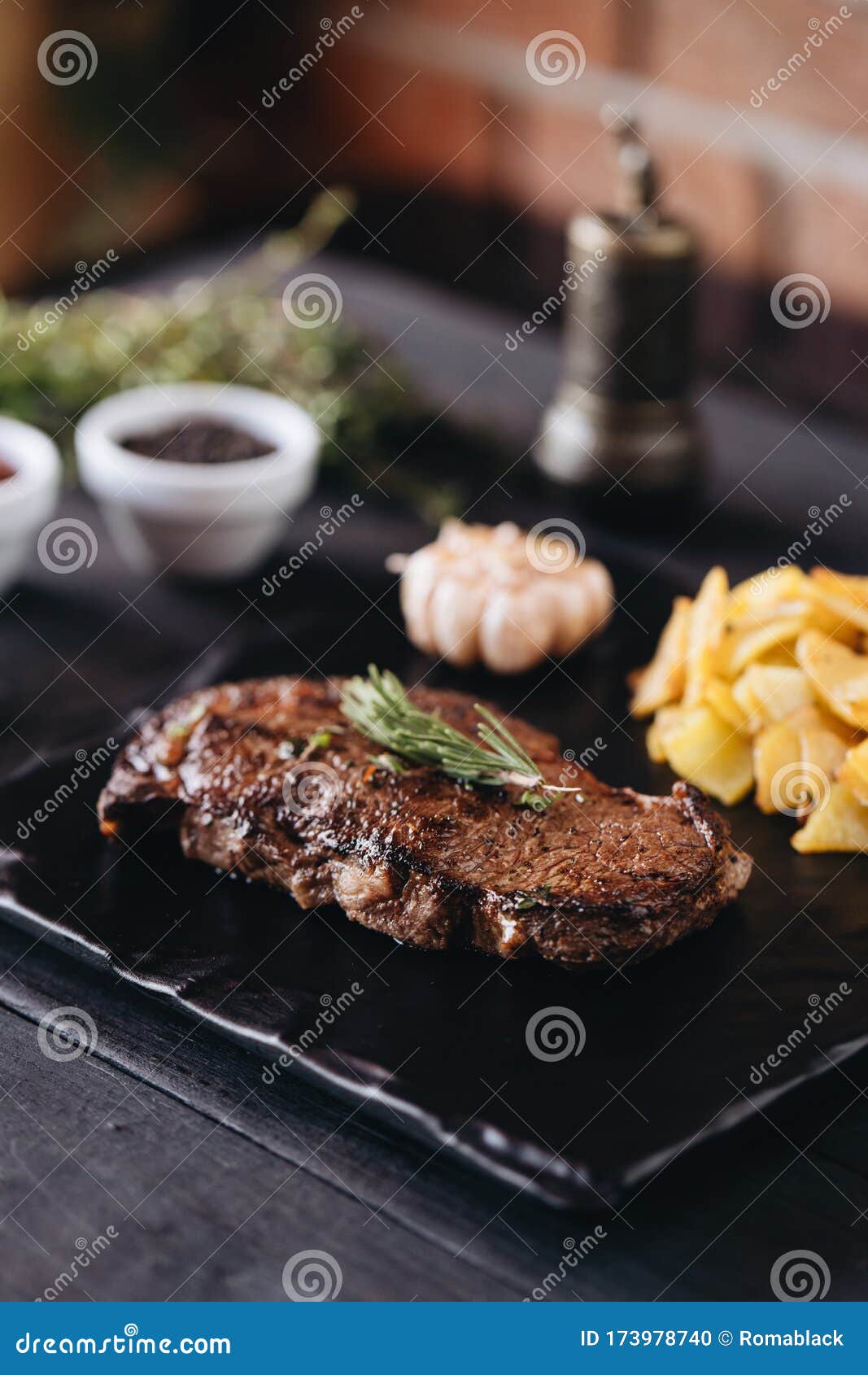 Rare Filet Mignon Beefsteak with Roasted Potatoes Stock Photo - Image ...