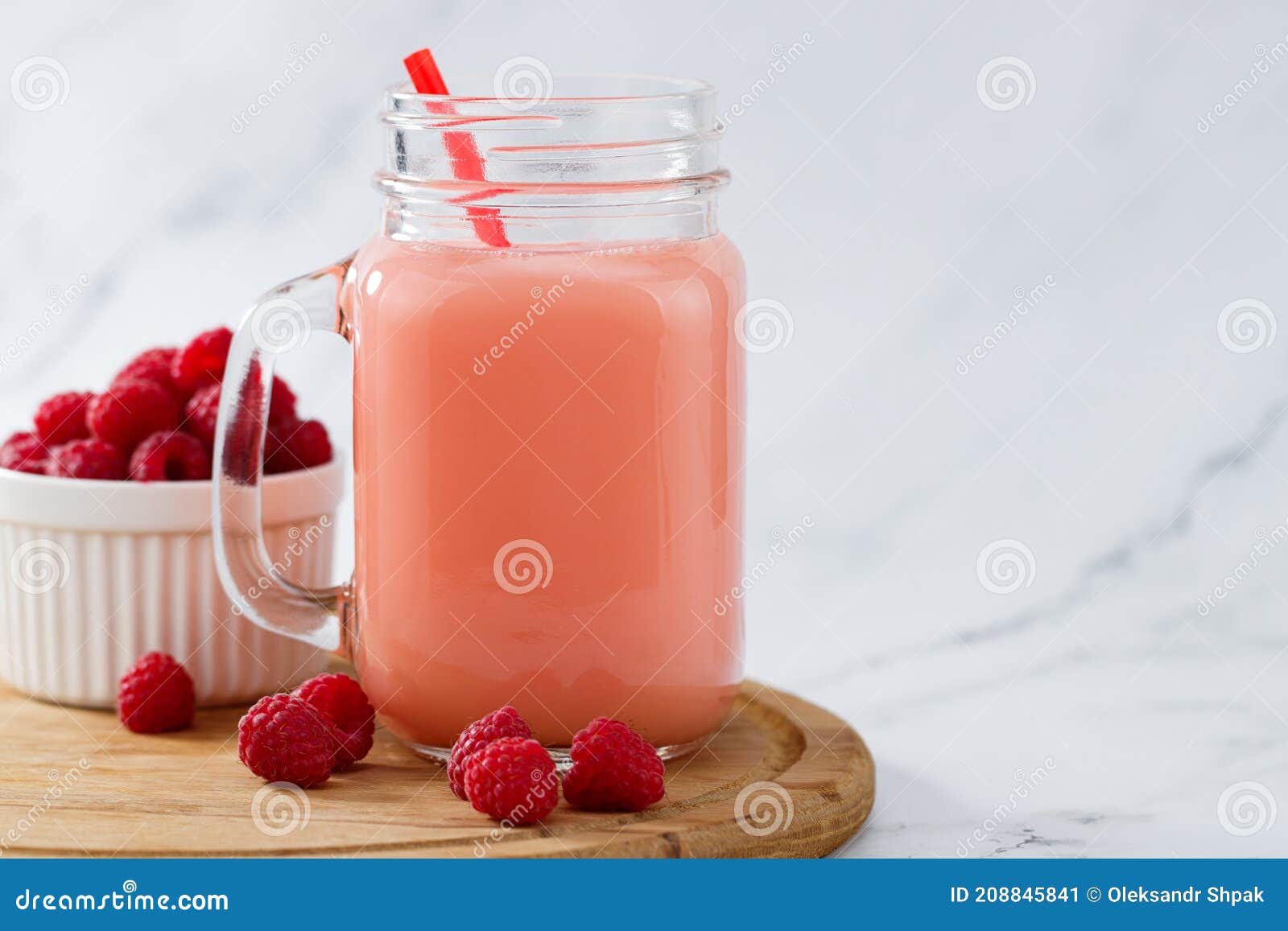 Raspberries Smoothie in a Glass Jar on the Breakfast with Raspberries