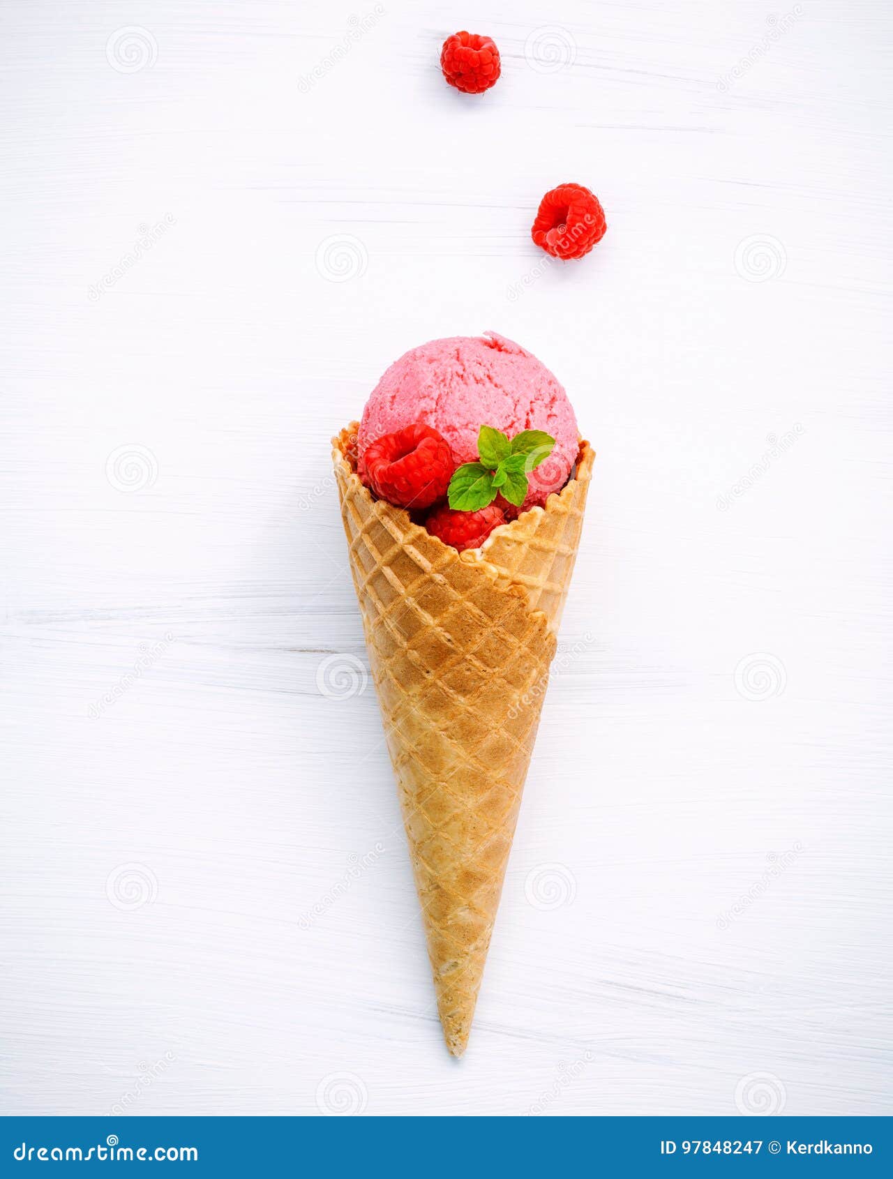 Raspberry Ice Cream In Cone With Fresh Raspberry And Peppermint Stock