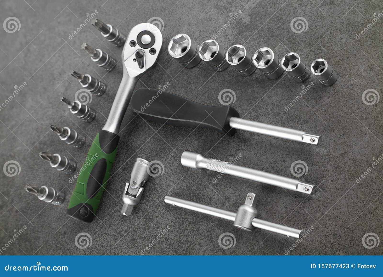 Ratchet Set with Heads, Different Socket Wrenches Closeup on a Dark