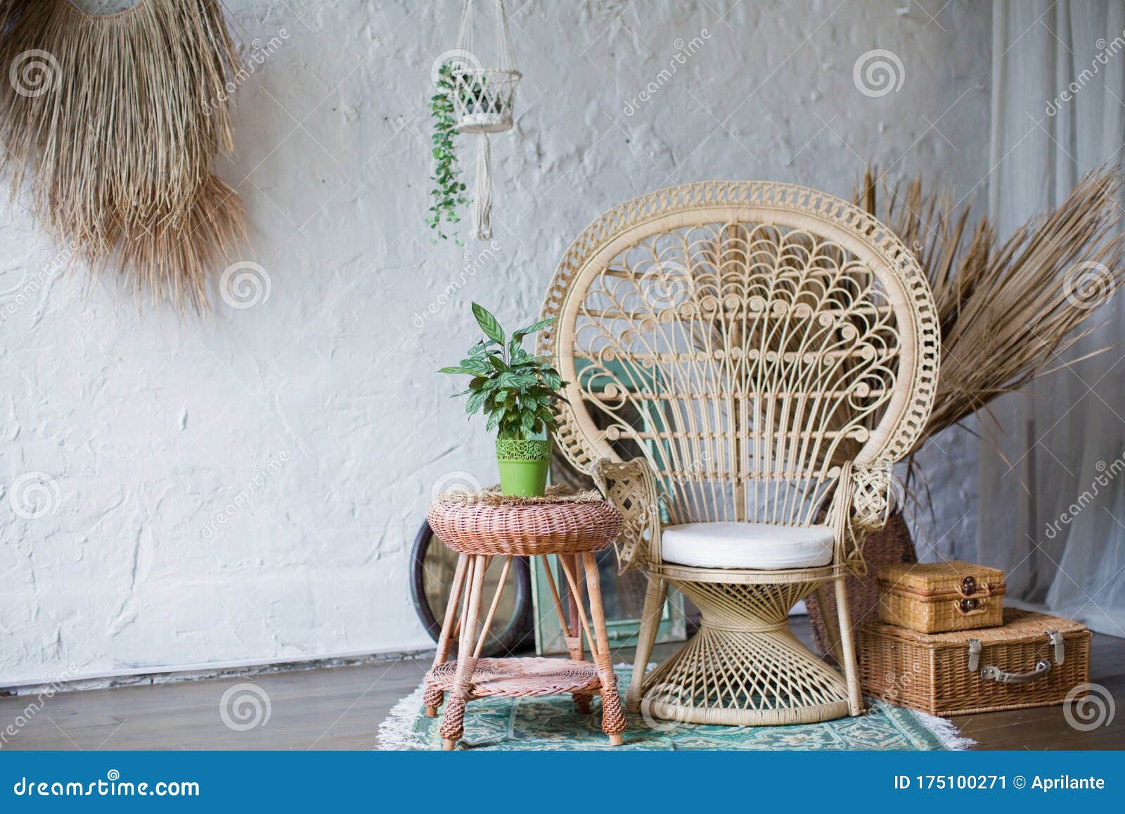 rattan peacock chair in loft room with boho decorations