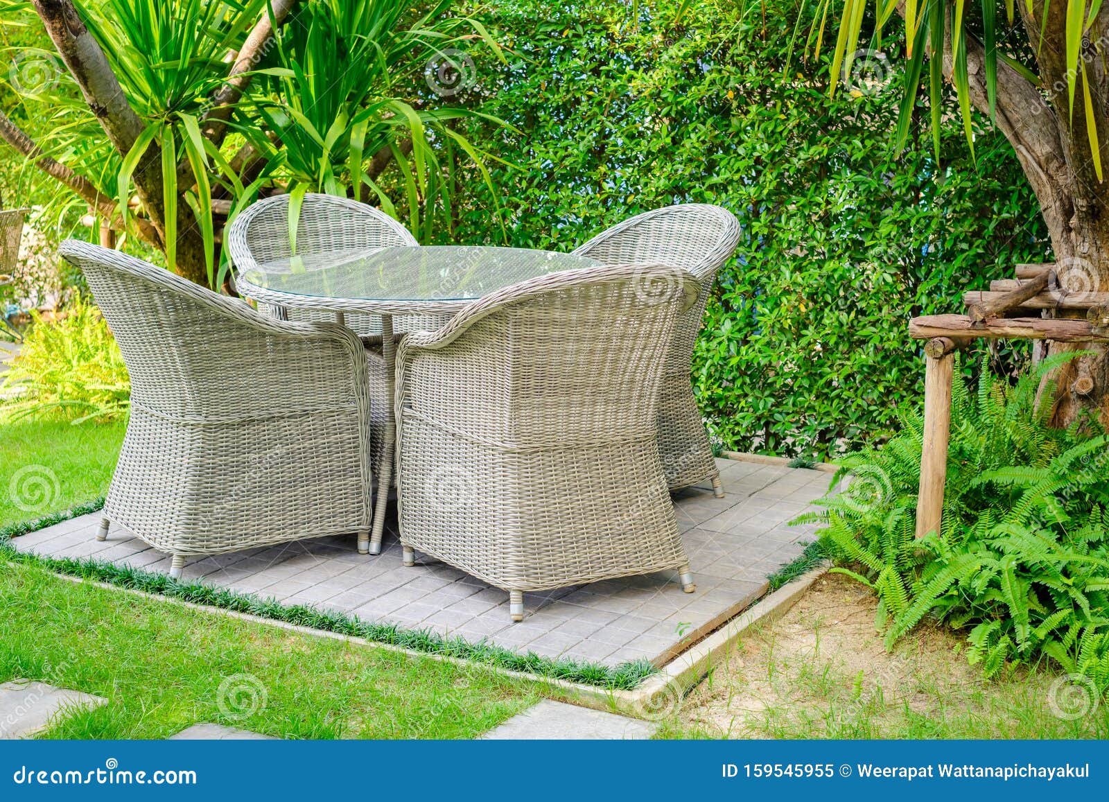 Rattan Table Set in the Garden Stock Image - Image of weave, modern
