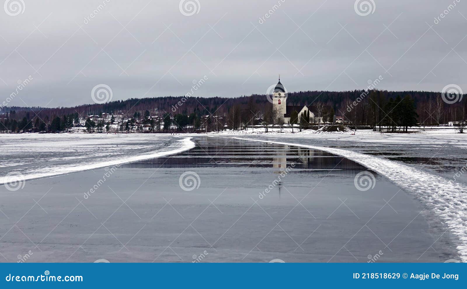 reflections of rattvik church in lake siljan in dalarna in sweden