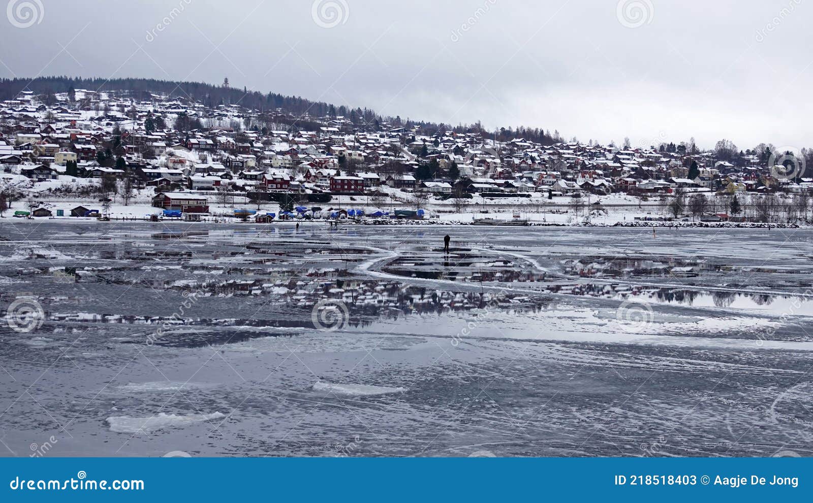 reflections of rattvik town in lake siljan in dalarna in sweden