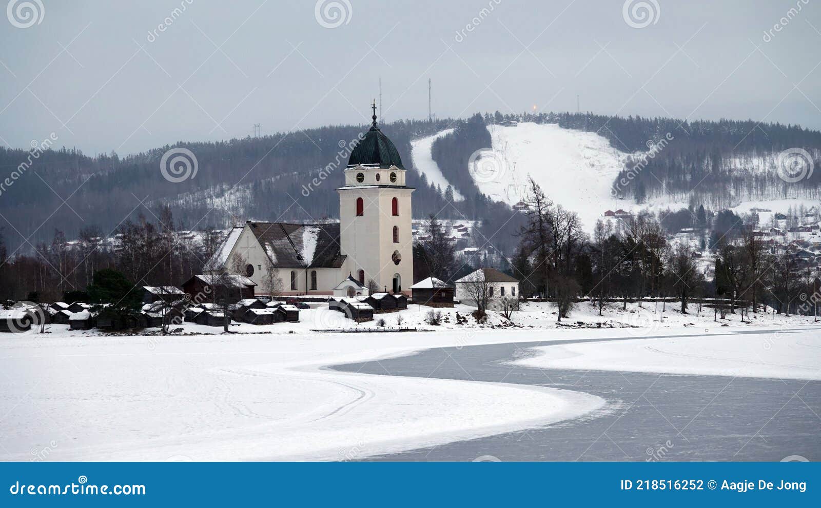 rattvik kyrka on frozen lake siljan in dalarna in sweden