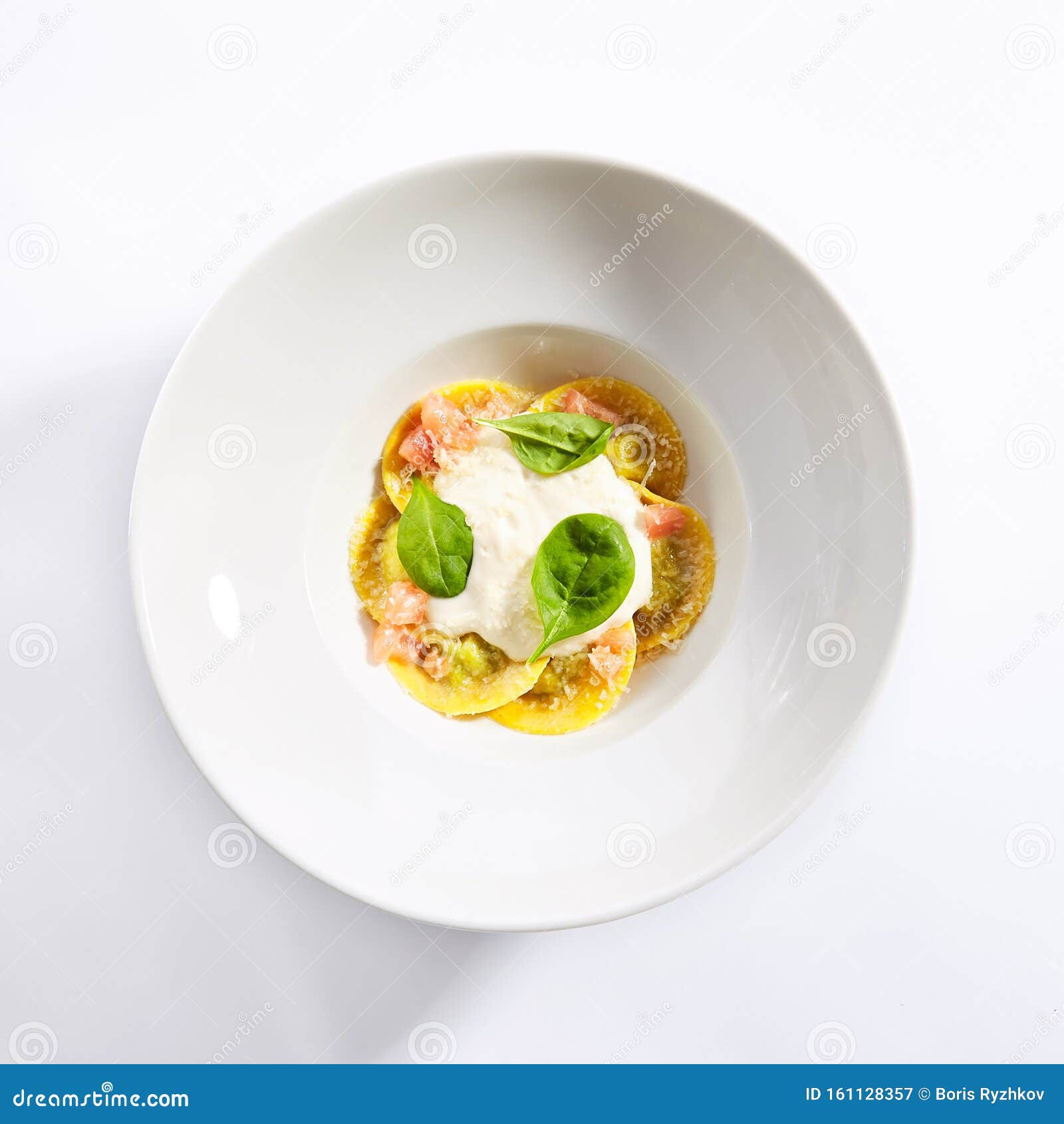 ravioli with spinach, concasse and cheese espuma