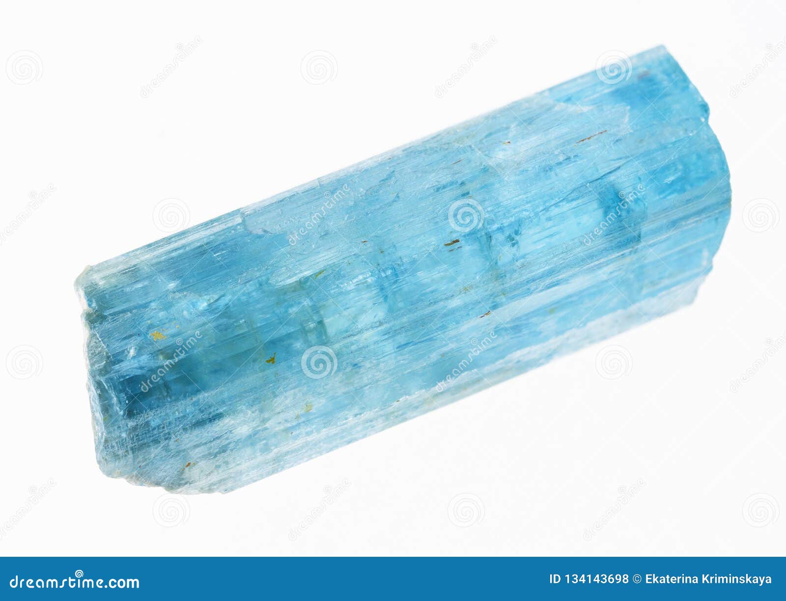 raw aquamarine (blue beryl) crystal on white