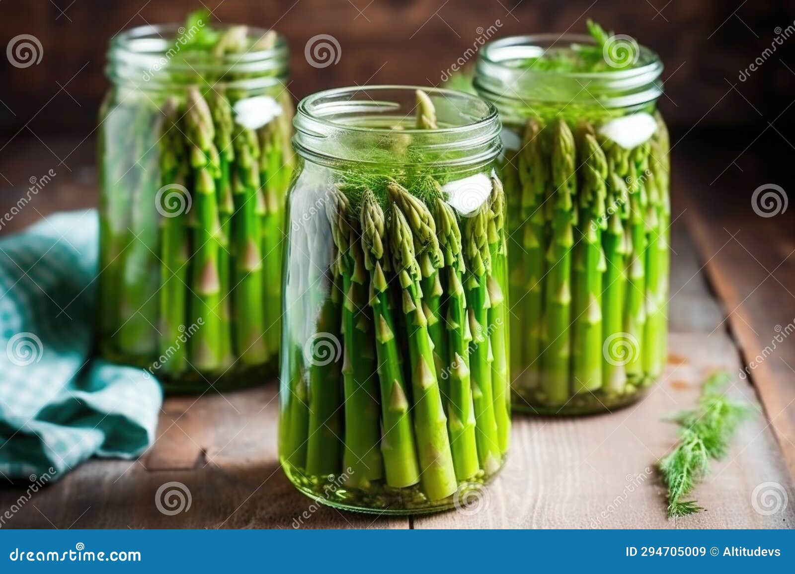 Raw Asparagus Spears Arranged Vertically in a Glass Jar Stock Image