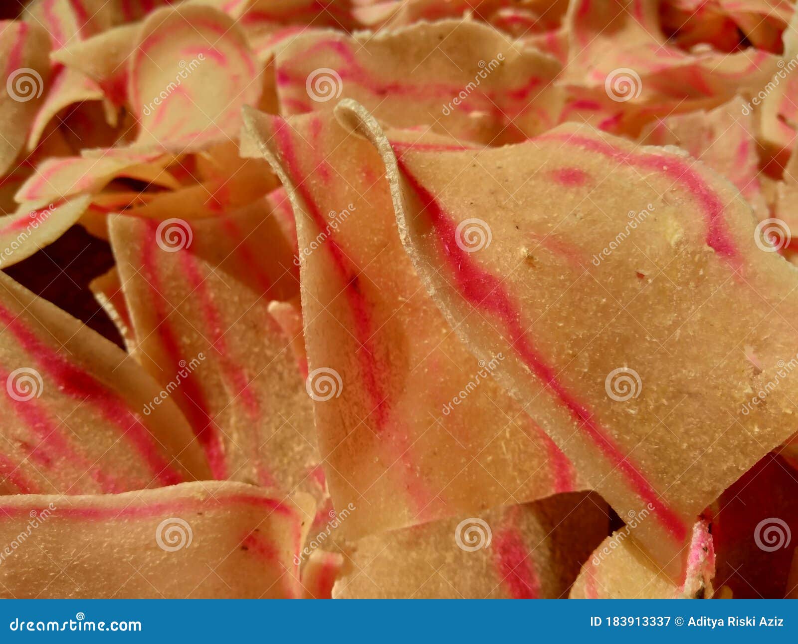 raw cassava chips. indonesia javanese called it as opak telo. traditional chips made off cassava. the taste is crunchy, savory,