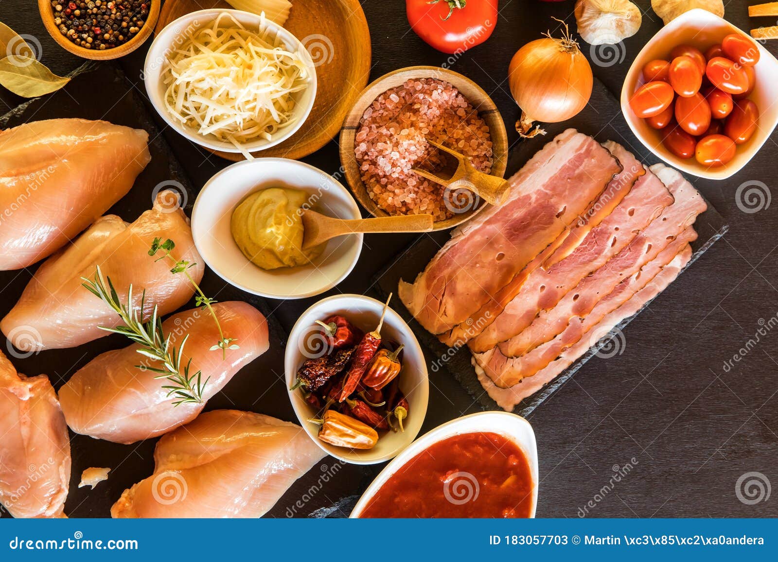 Raw Chicken and Bacon on the Table Top. Ingredients for Healthy Food