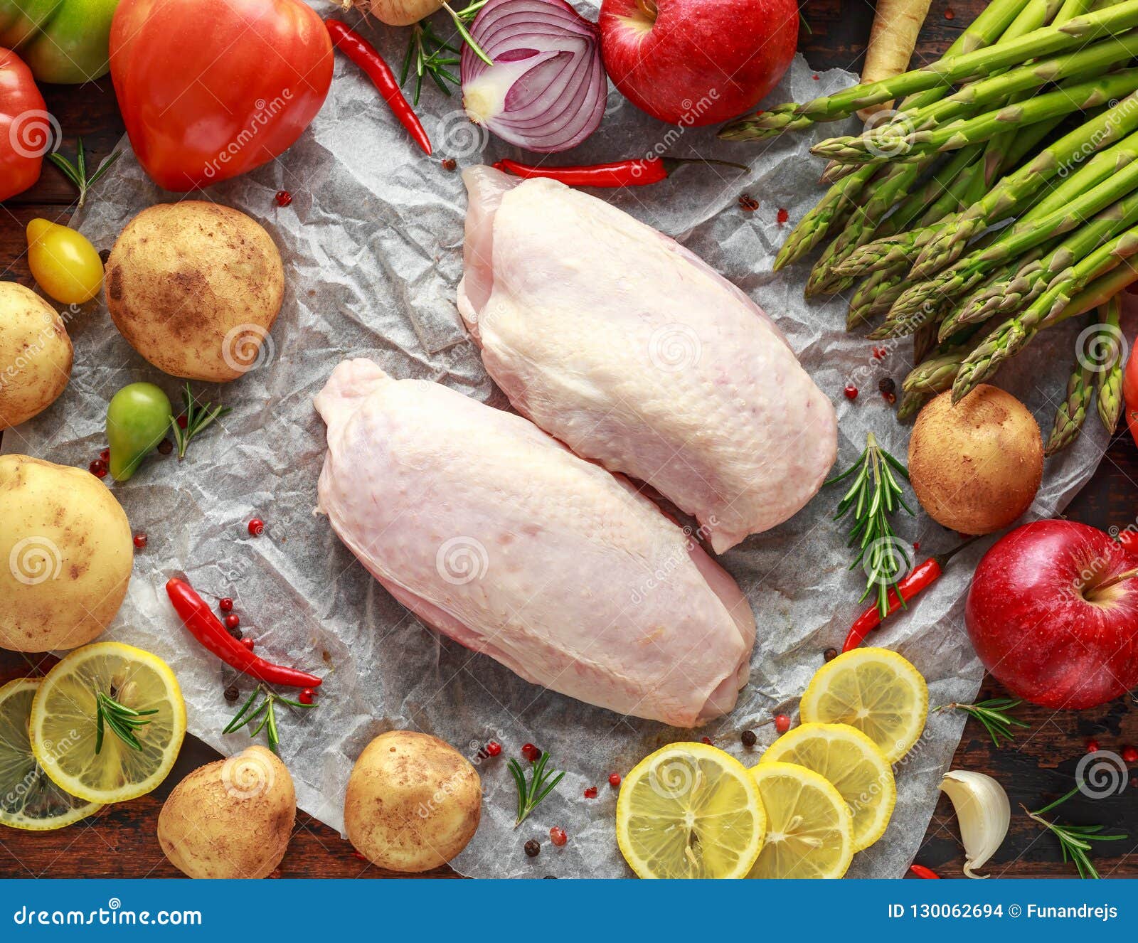Raw Chicken Breast on Baking Paper with Variety of Vegetables Stock Photo Image of cooking