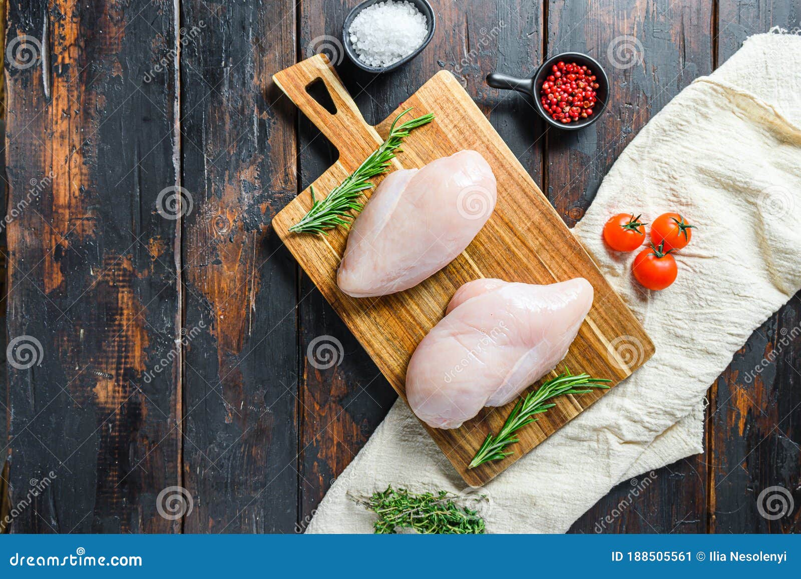 Raw Chicken Breast Fillets and Vegetable on Chopping Board Overdark ...
