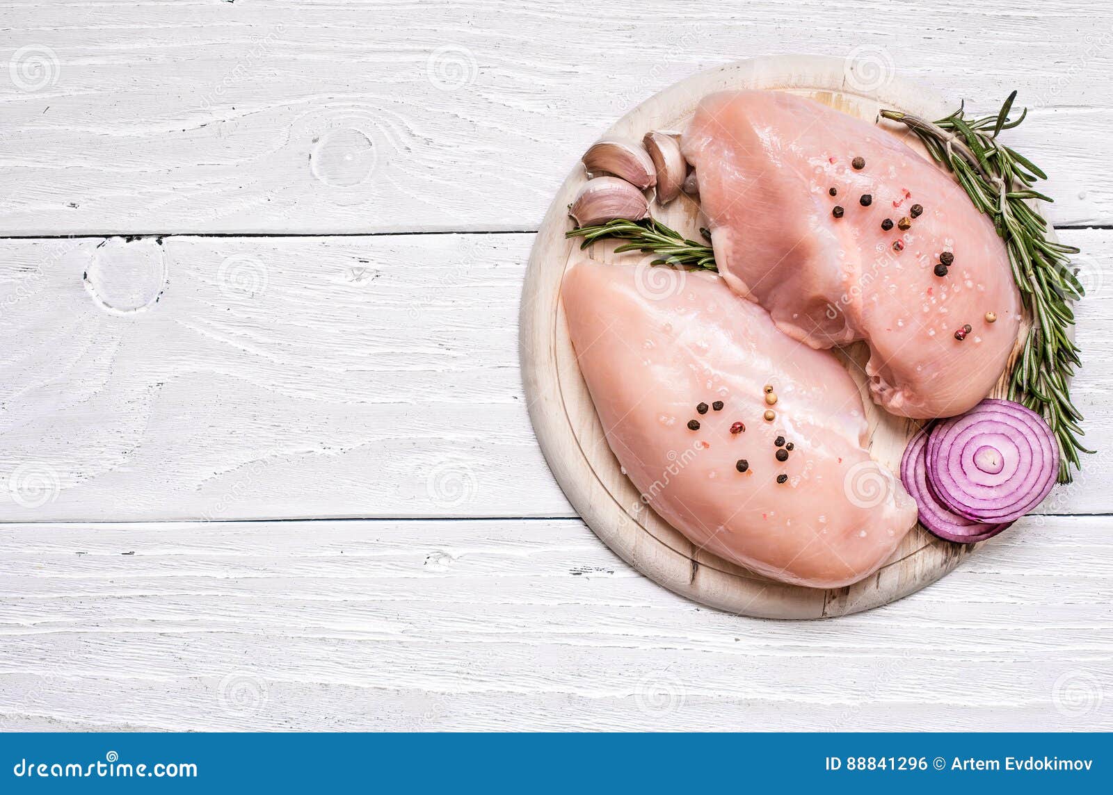 Raw Chicken Breast Fillets on Wooden Cutting Board Stock Photo - Image ...
