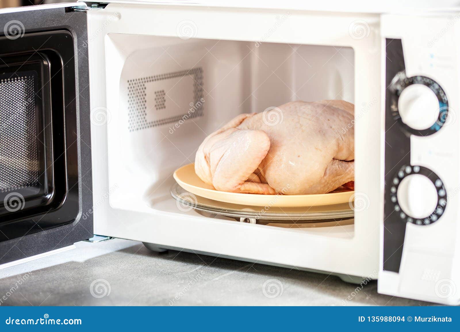 Raw Chicken in the Microwave Stock Photo Image of defrost, home 135988094