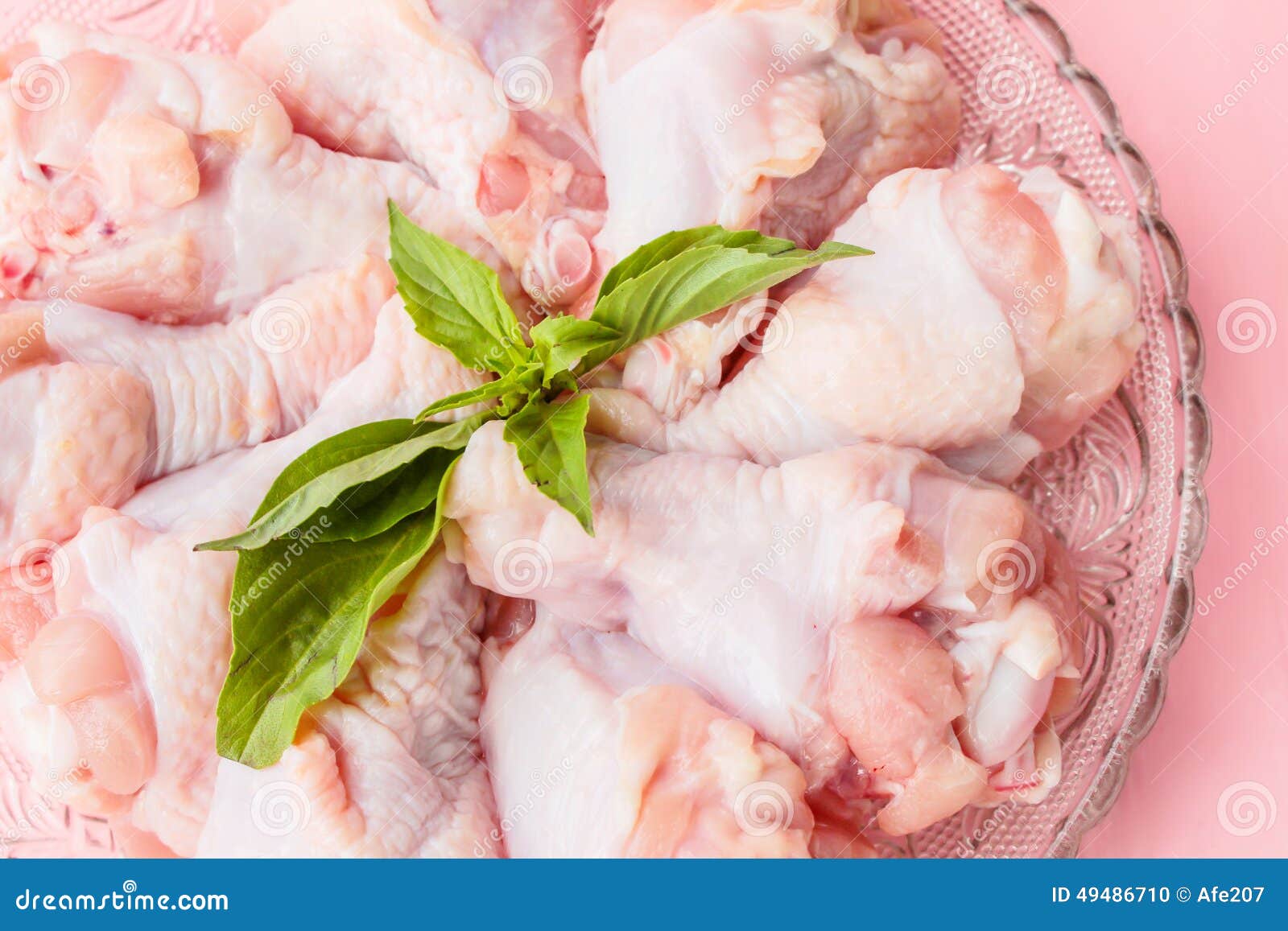 Raw chickens on plate stock photo. Image of meat, thigh 49486710