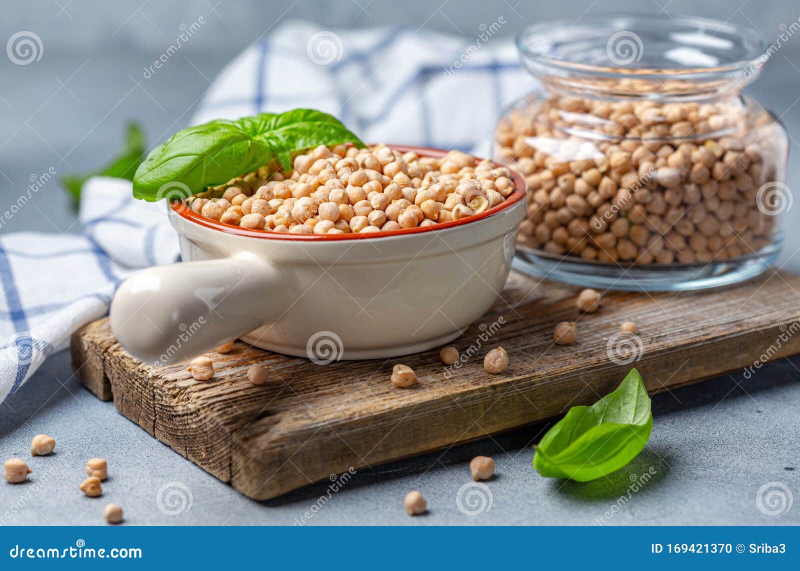 raw chickpeas and green basil