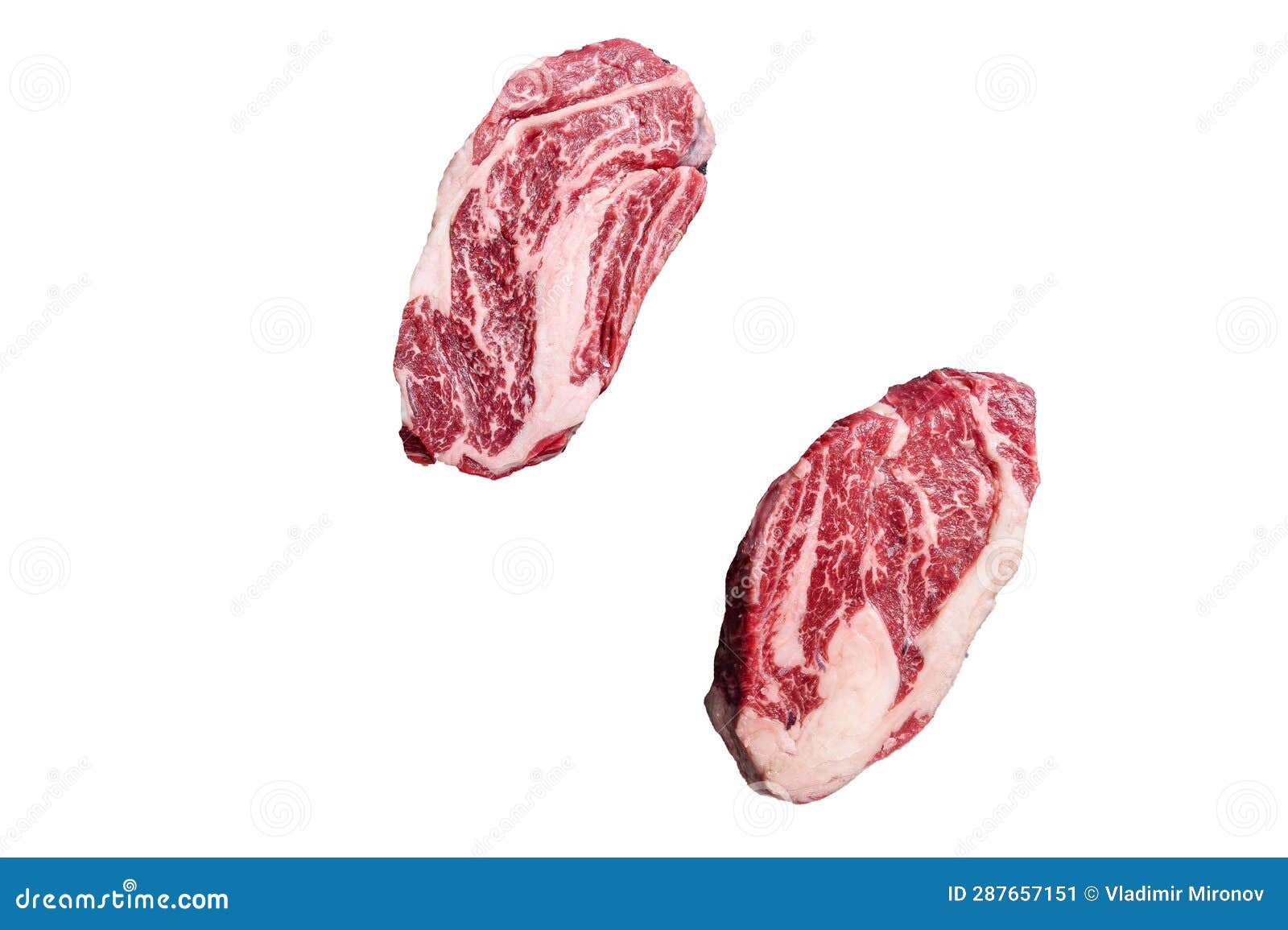 Raw Chuck Eye Roll Steaks, Premium Beef Meat on a Butcher Board. High Quality Isolate, White