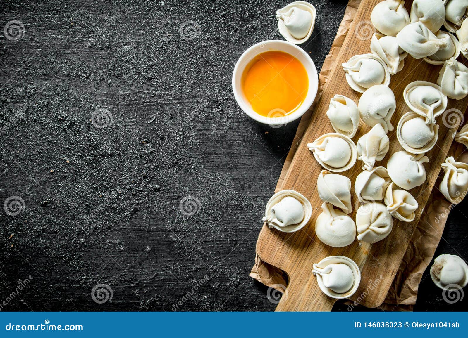 Raw dumpling with egg yolk stock image. Image of food 146038023