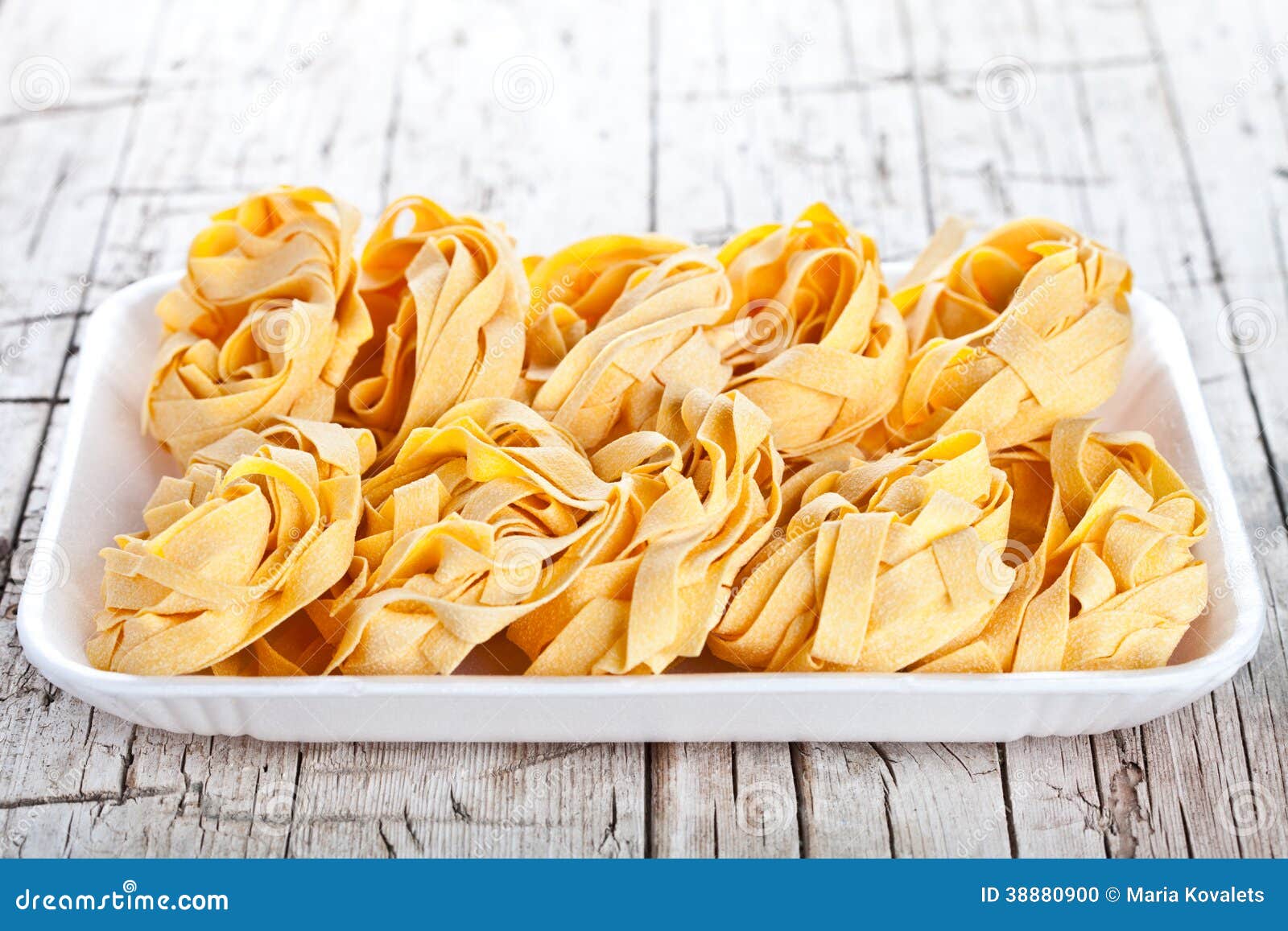 Raw egg pasta in a plate stock photo. Image of gourmet 38880900