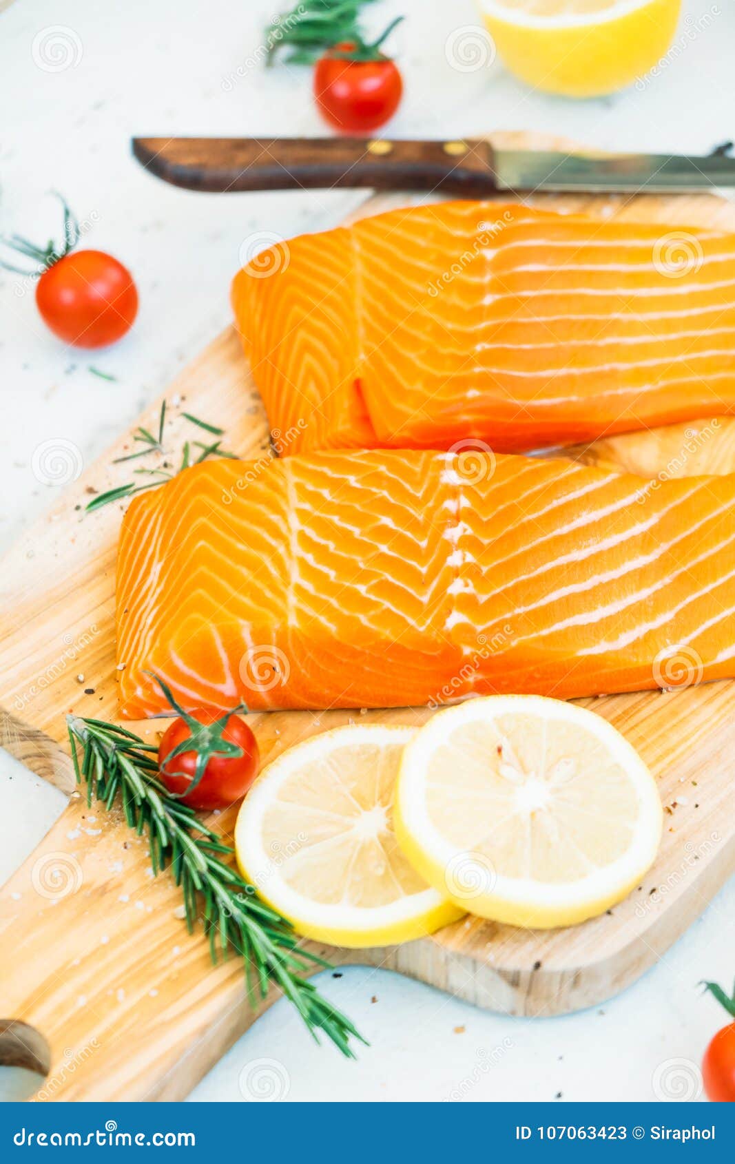 Raw and Fresh Salmon Meat Fillet on Wooden Cutting Board Stock Image ...