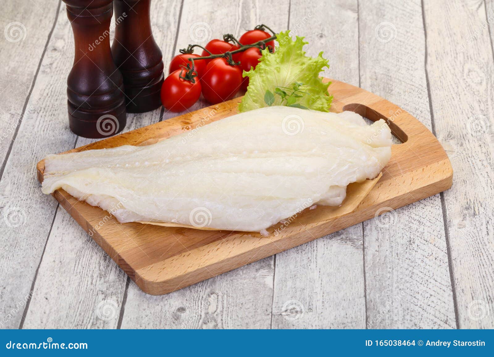 Raw halibut fillet stock photo. Image of black, delicious 165038464