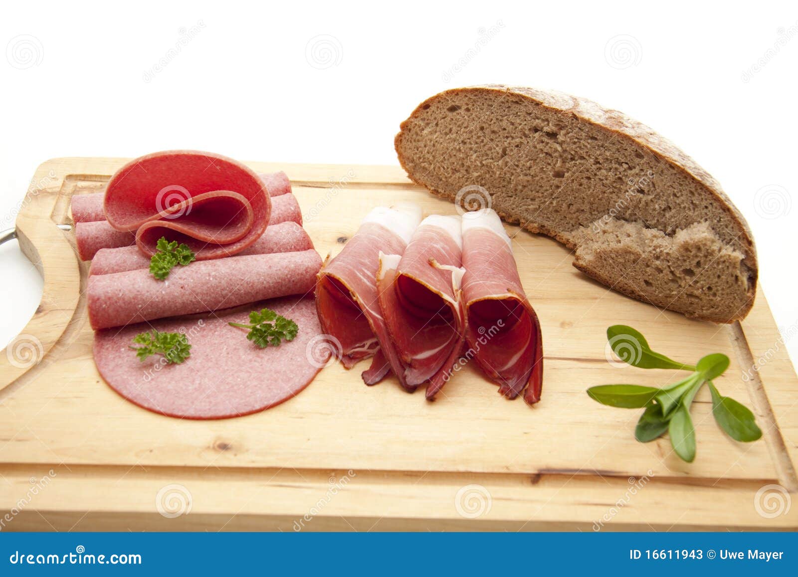 Raw ham and salami stock image. Image of eating, board 16611943