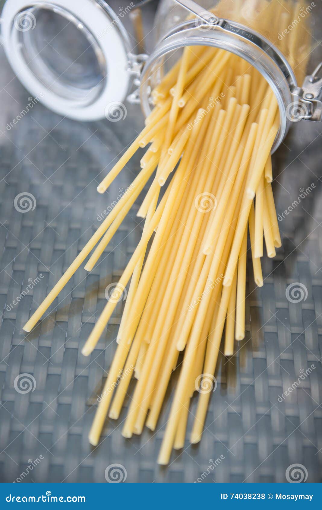 Raw italian spaghetti in jar, food