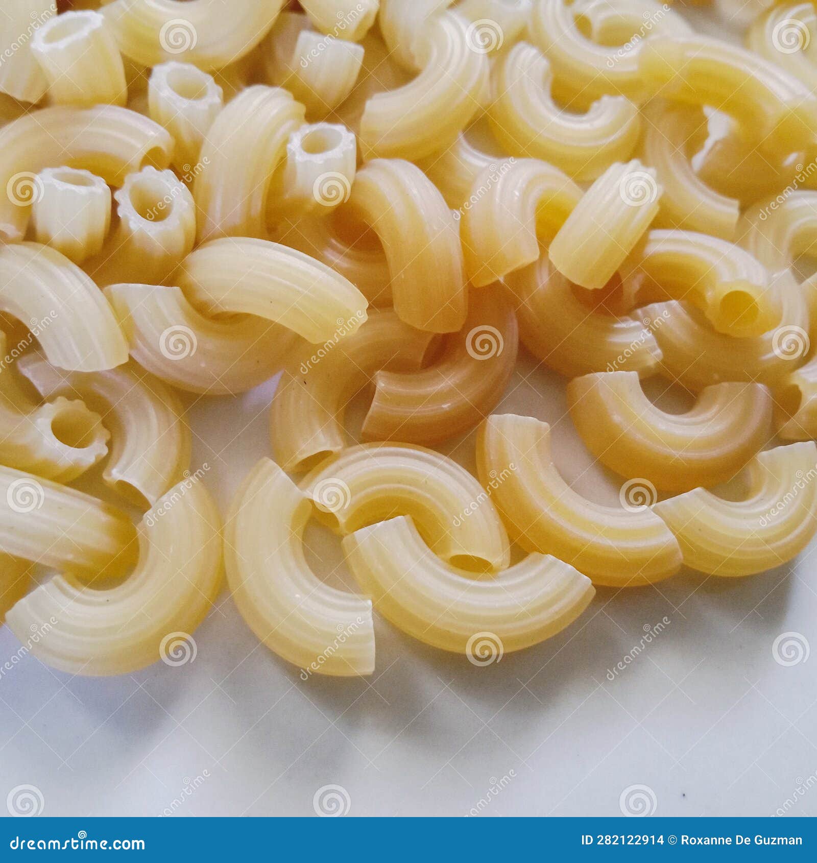 Raw Macaroni Noodles stock photo. Image of food, dish 282122914