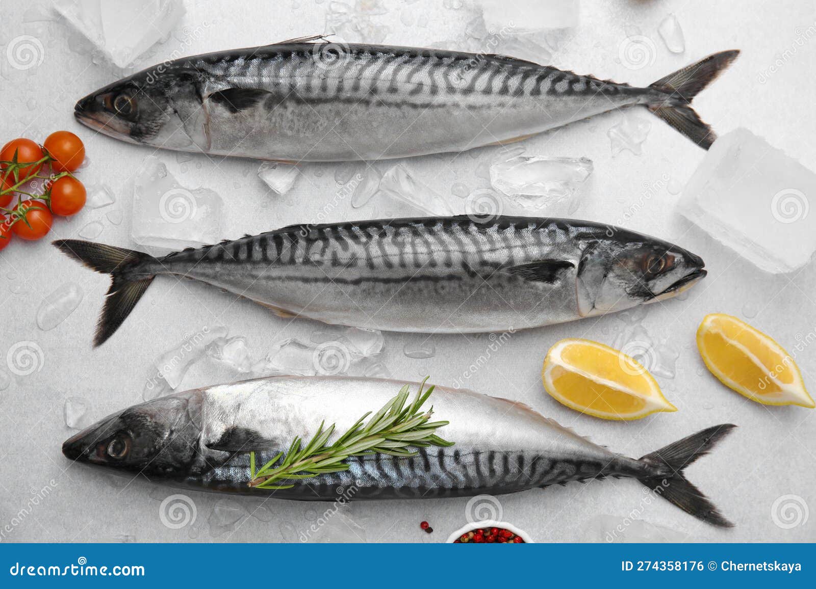 Raw Mackerel, Tomatoes and Lemons on Light Gray Table, Flat Lay Stock