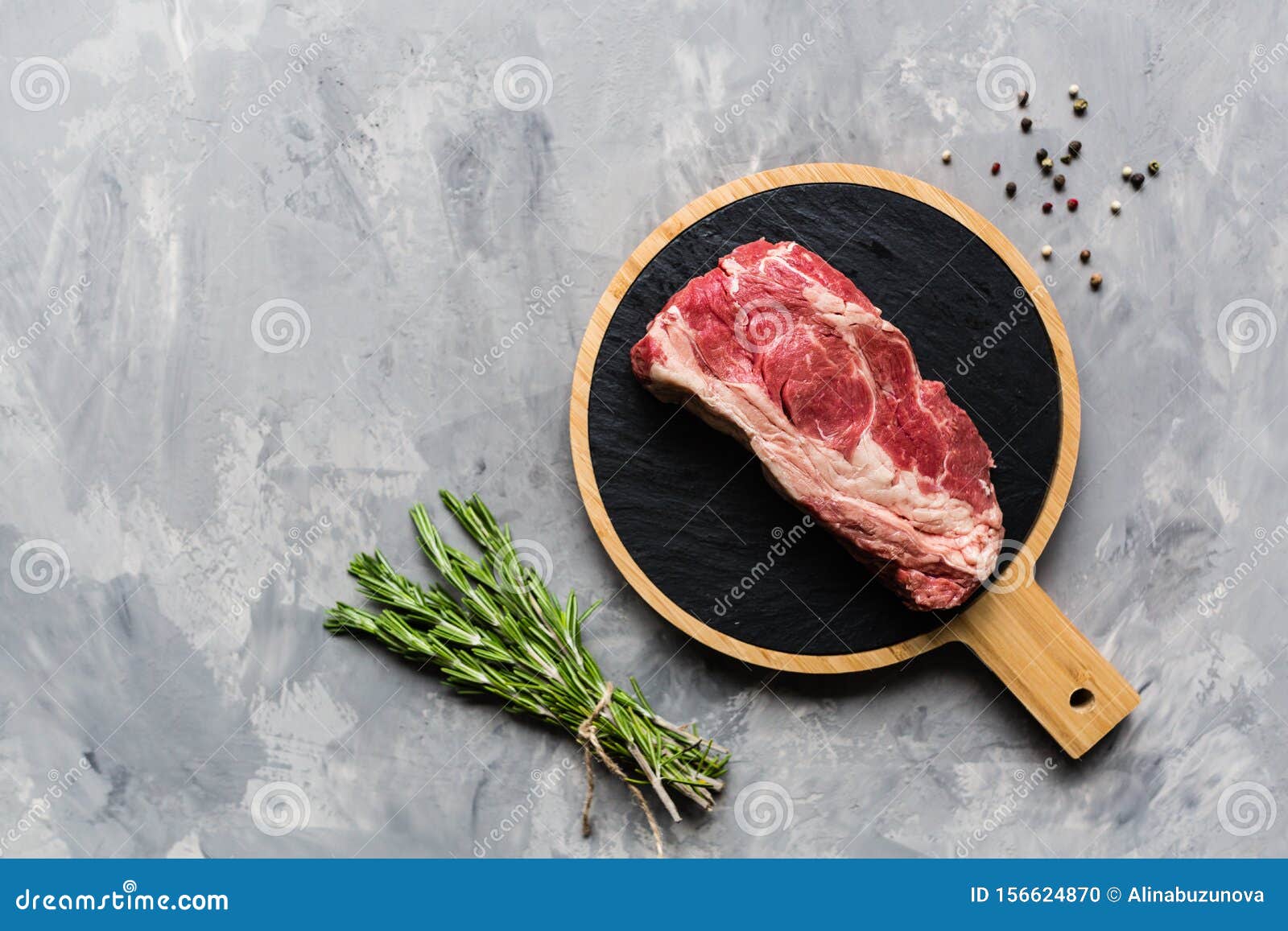 Download Raw Meat Beef On A Cutting Board With Rosemary And Spices ...