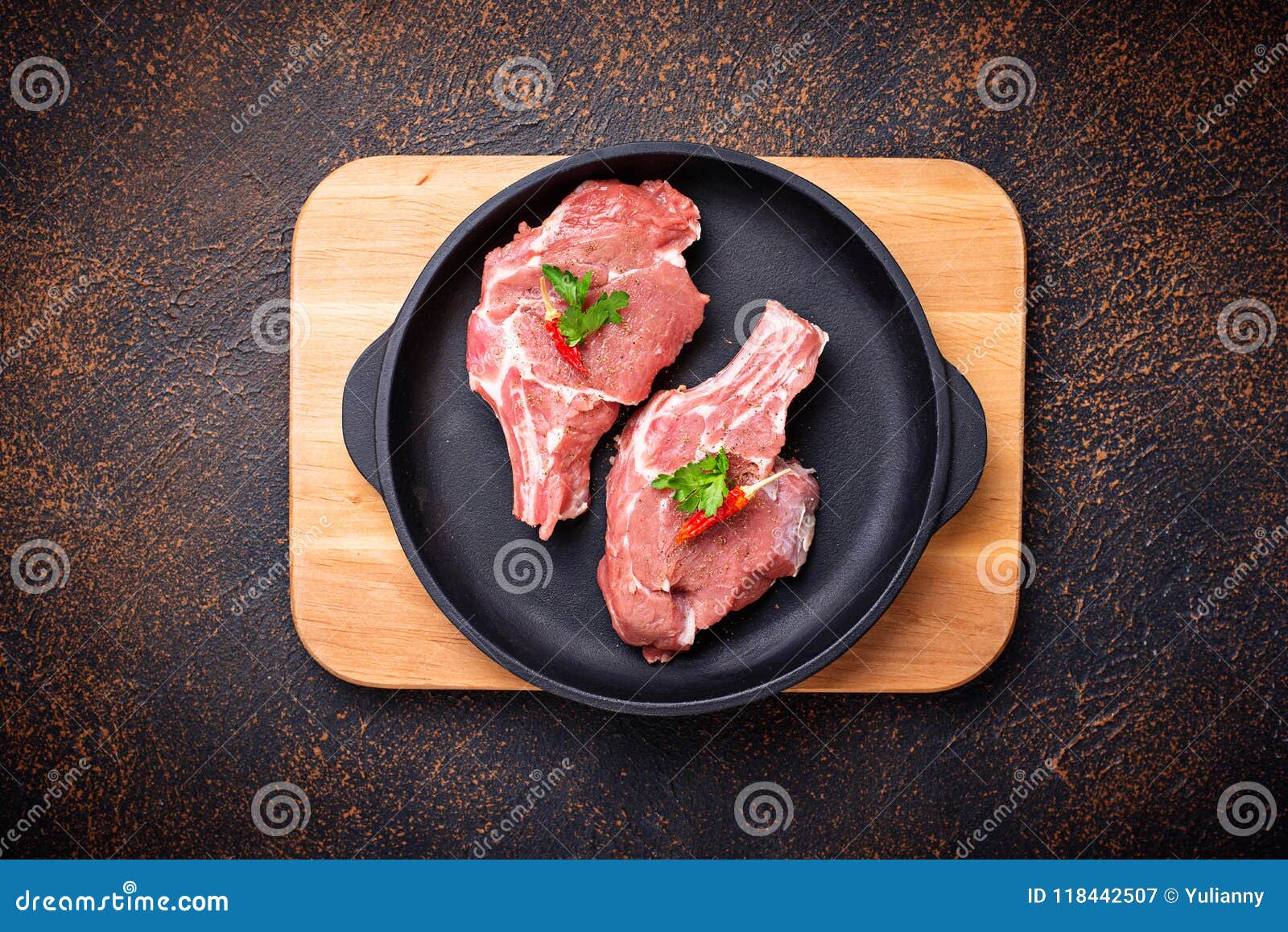 Raw meat in cast iron pan stock image. Image of knife 118442507