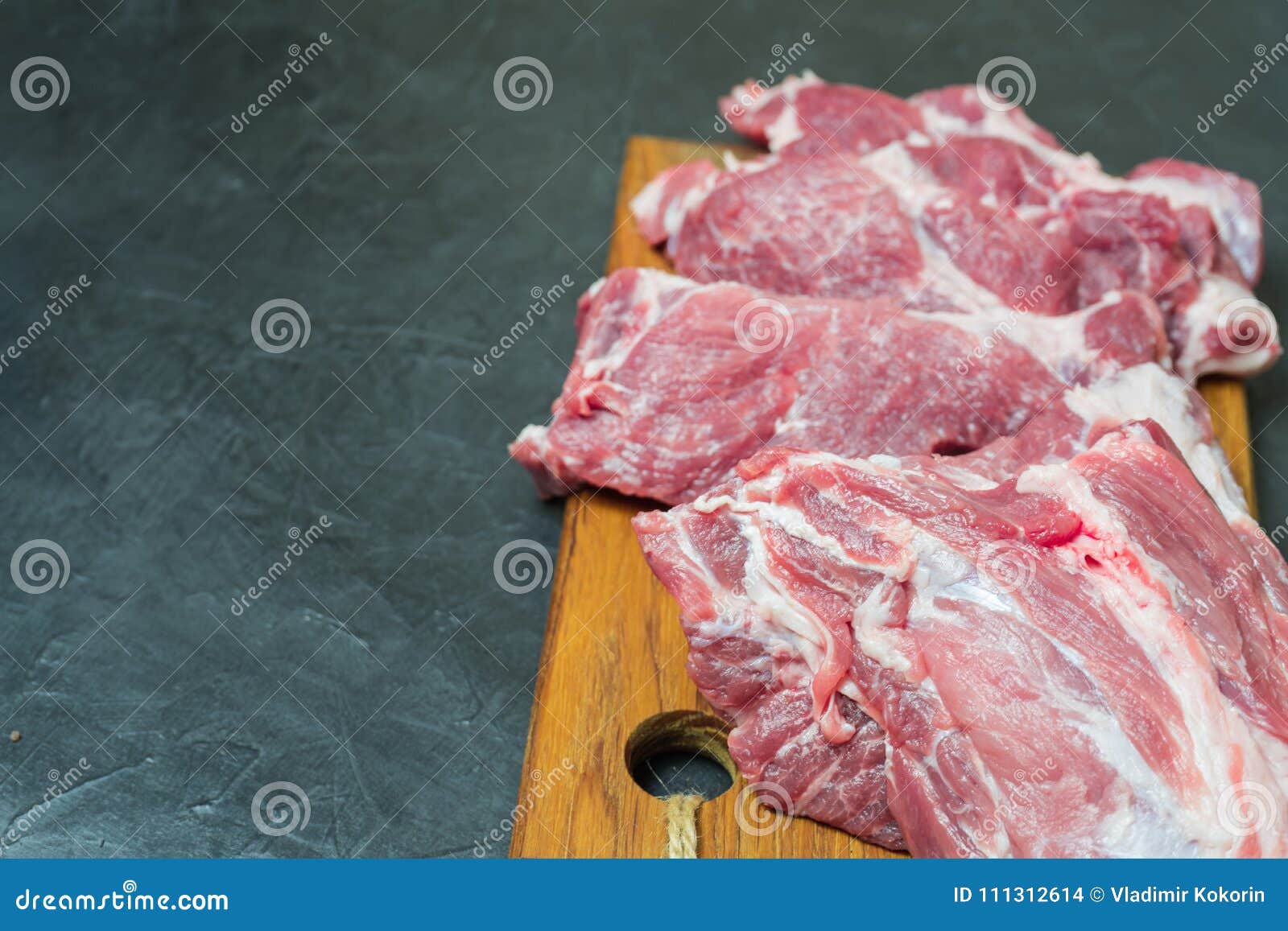 Raw Meat on a Cutting Board. Place for Your Text Stock Photo Image of
