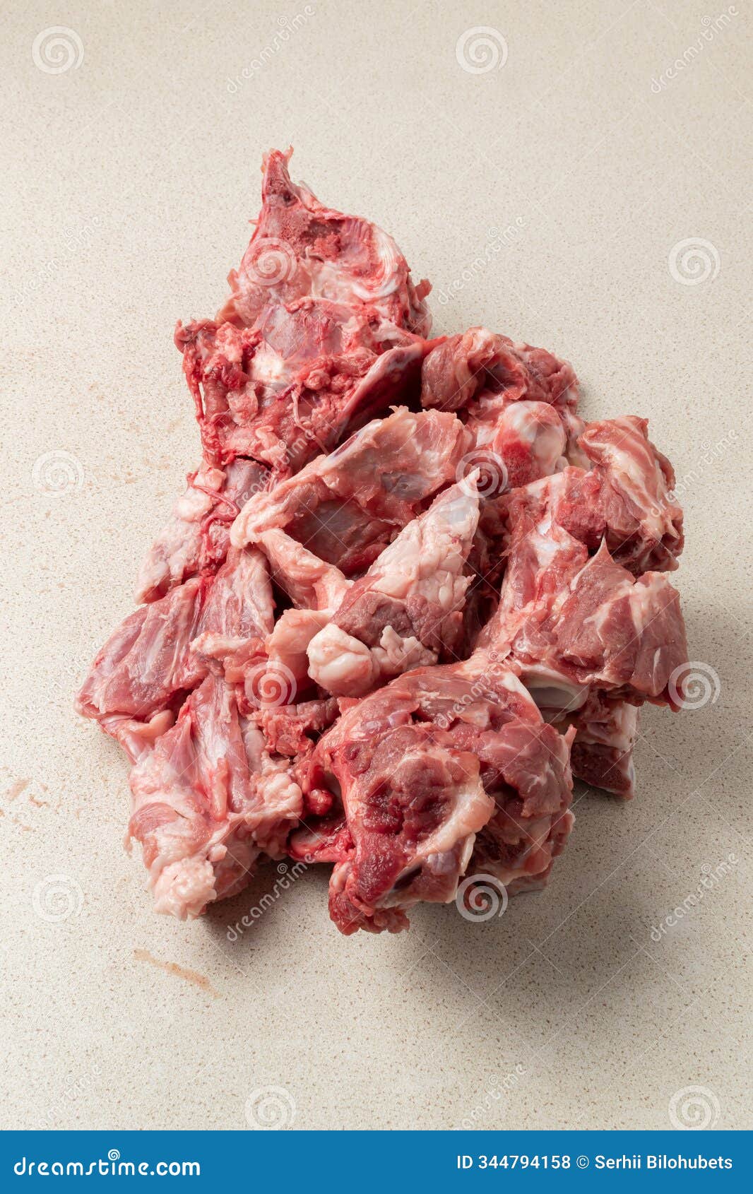 raw meat trimmings. heap of raw pork bones