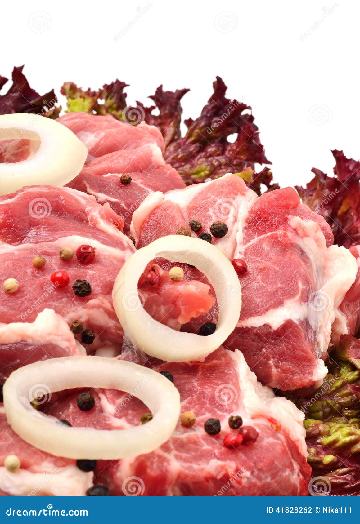 Raw Meet Pieces with Sliced Onion and Black Pepper Stock Photo Image