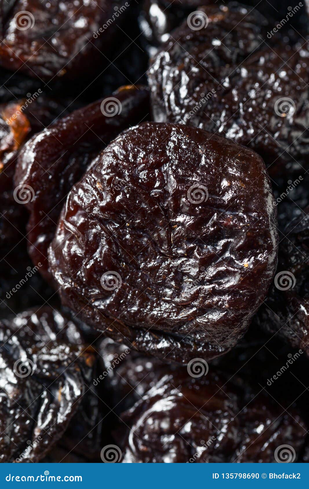 Raw Organic Dry Prunes stock photo. Image of leaf, heap 135798690
