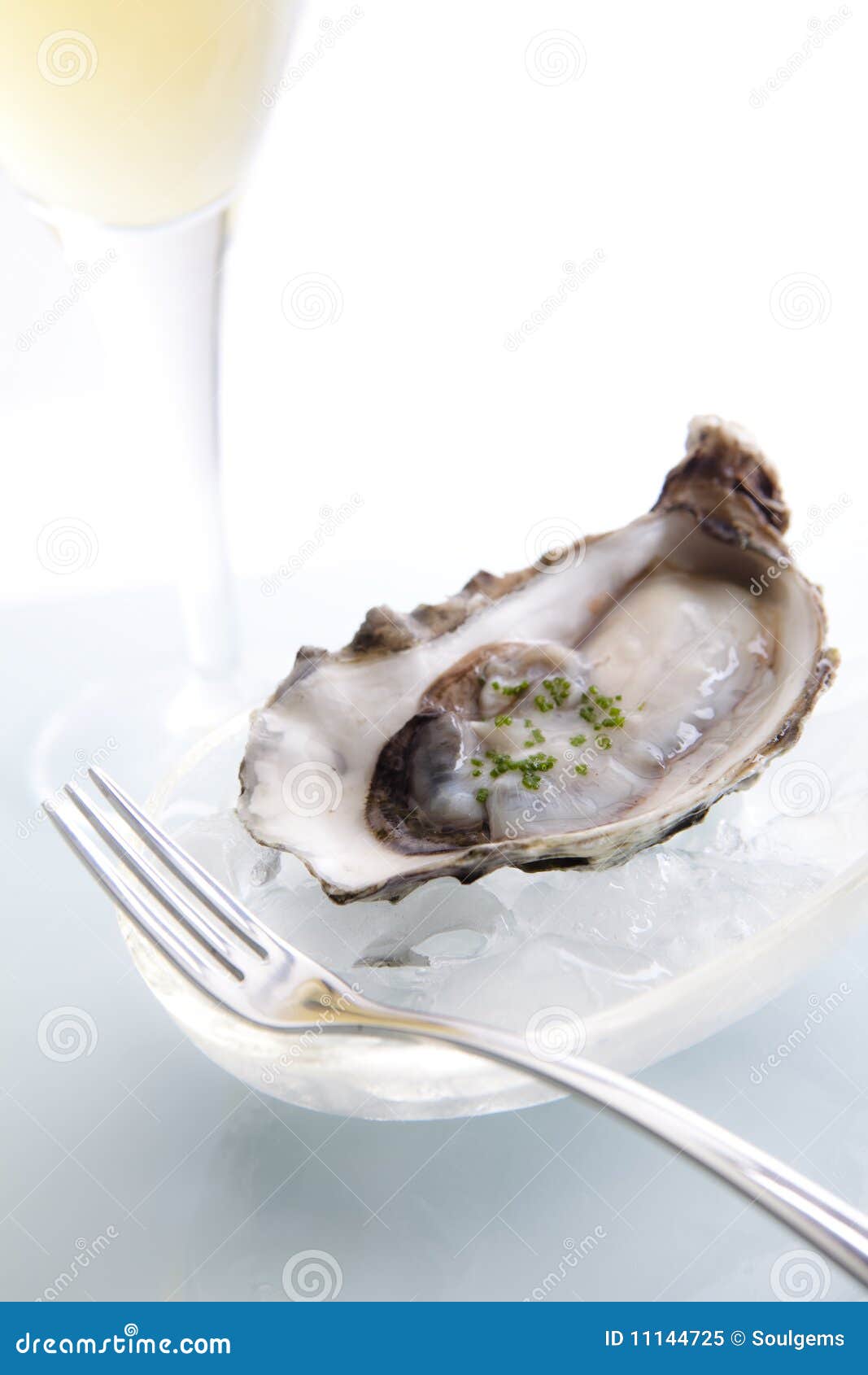 raw oyster on ice