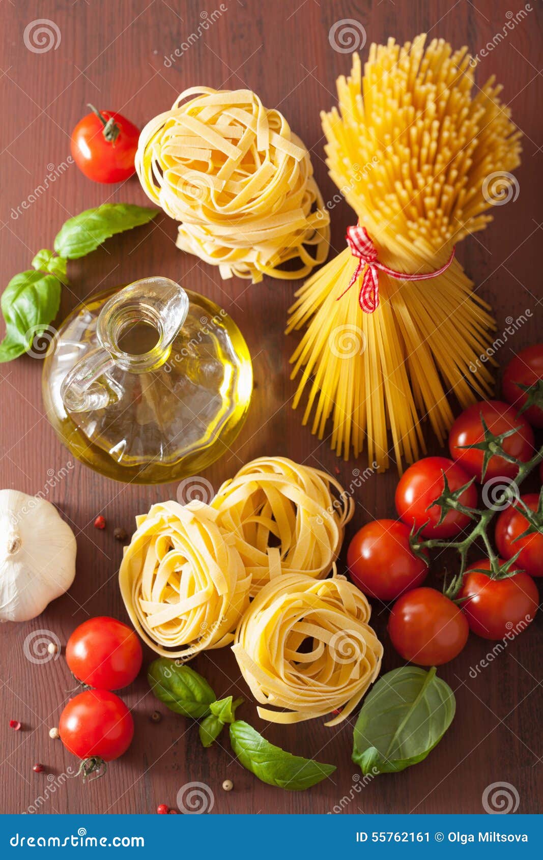 Raw Pasta Olive Oil Tomatoes. Italian Cuisine in Rustic Kitchen Stock