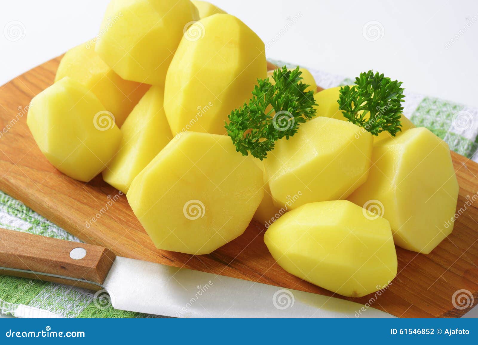 Raw peeled potatoes stock photo. Image of halved, ingredient 61546852