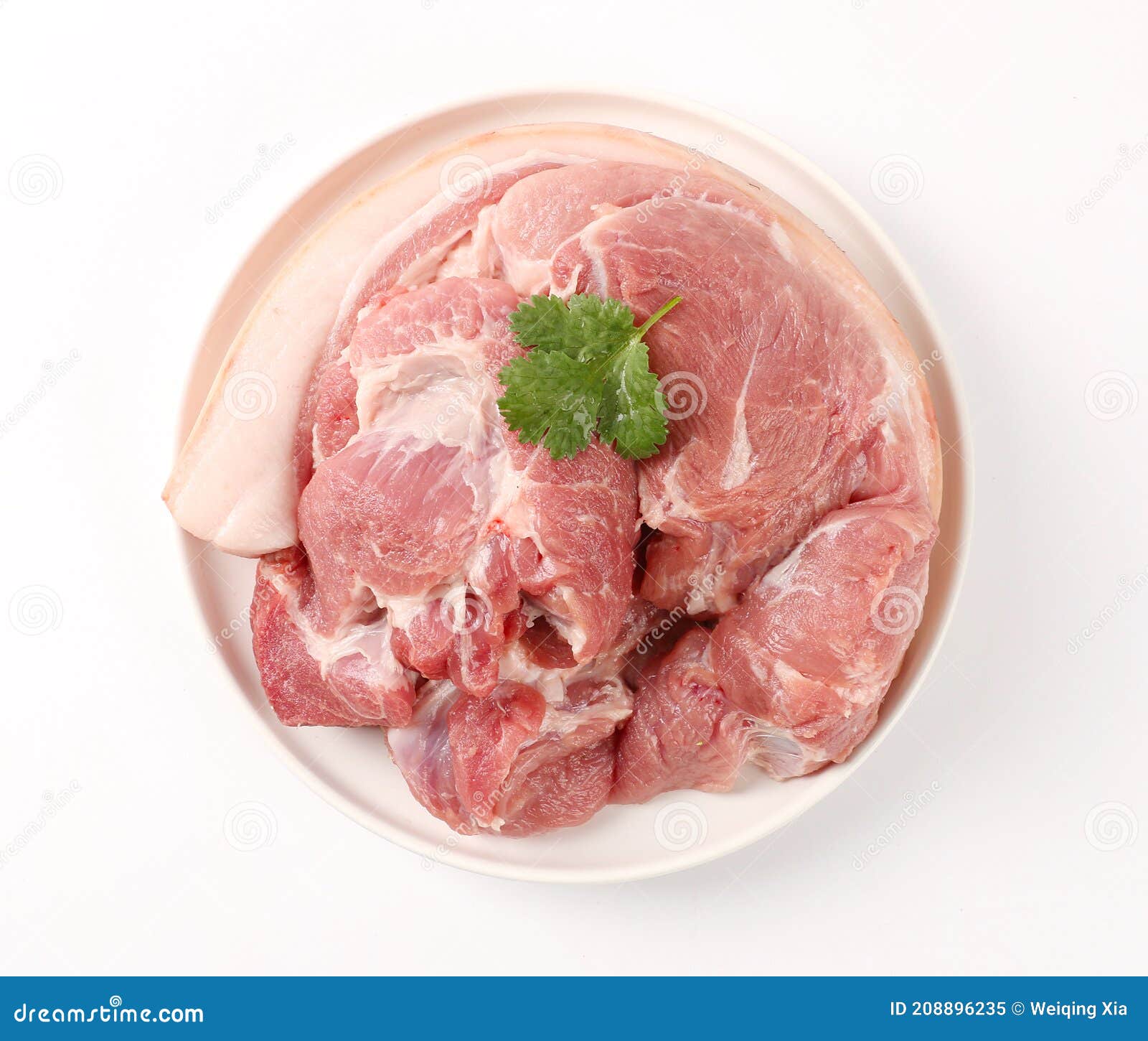slices of pork with rosemary  on white background