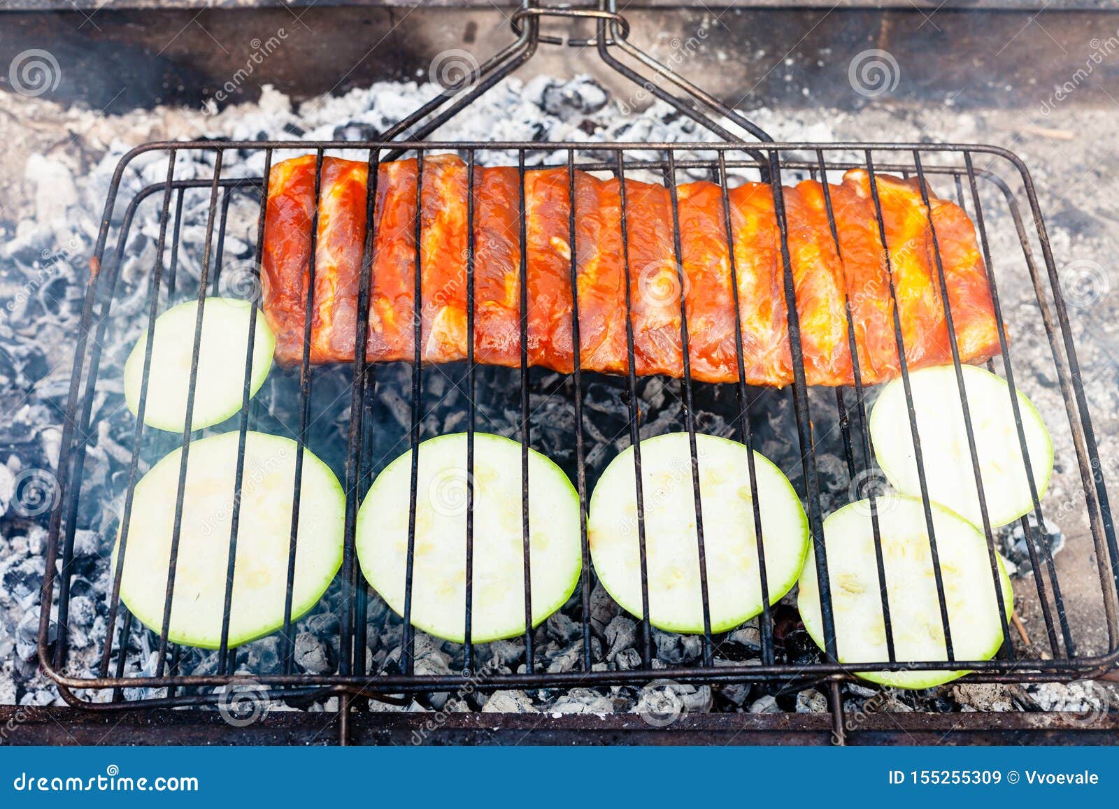 Raw Pork Ribs with Sliced Squash in Outdoor Grill Stock Image - Image ...