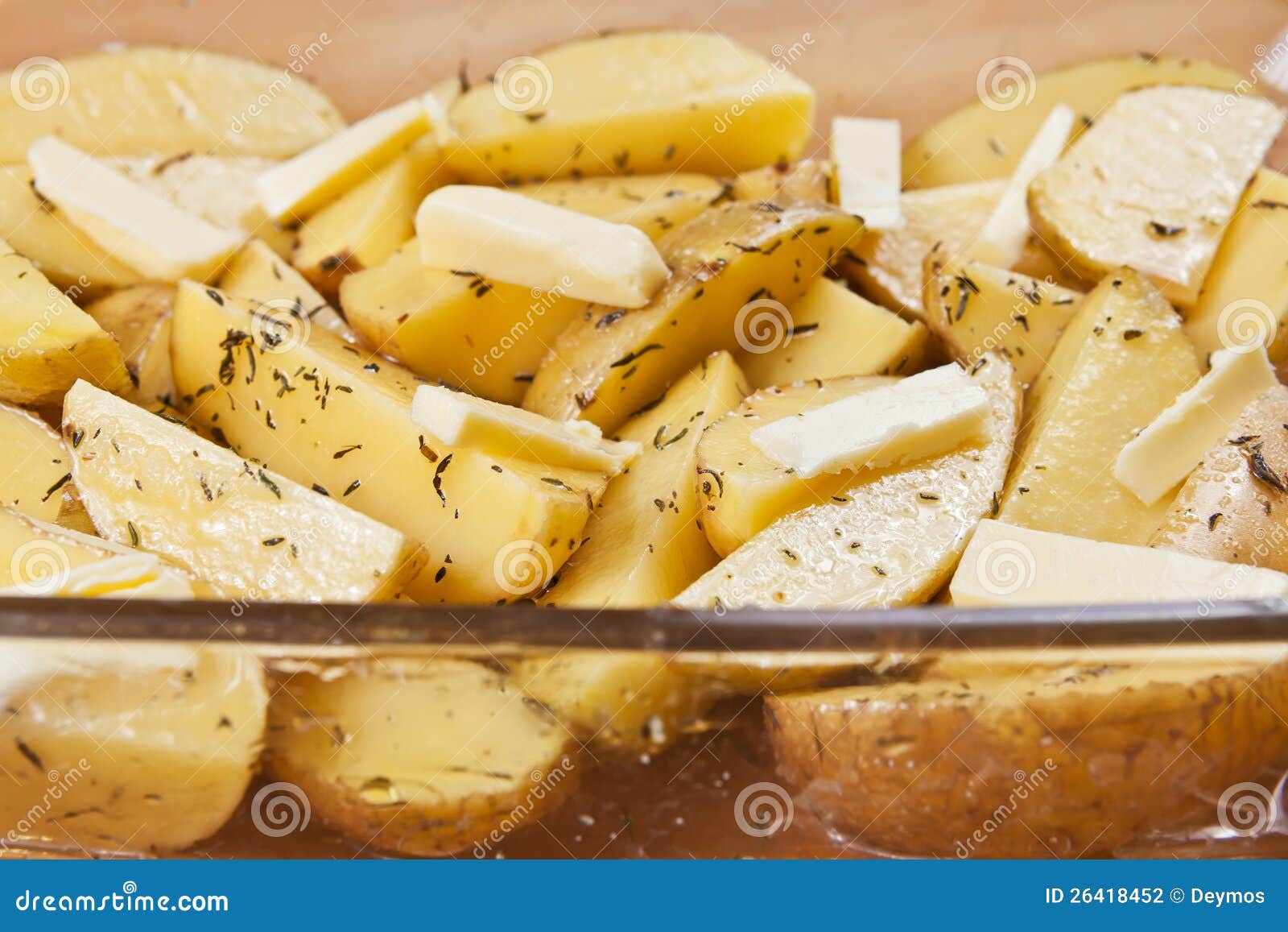Raw Potatoes in a Glass Tray, Ready To Be Roasted Stock Photo Image