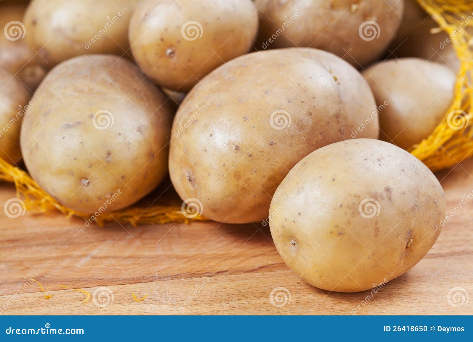 Raw potatoes in a sack stock photo. Image of diet, natural 26418650